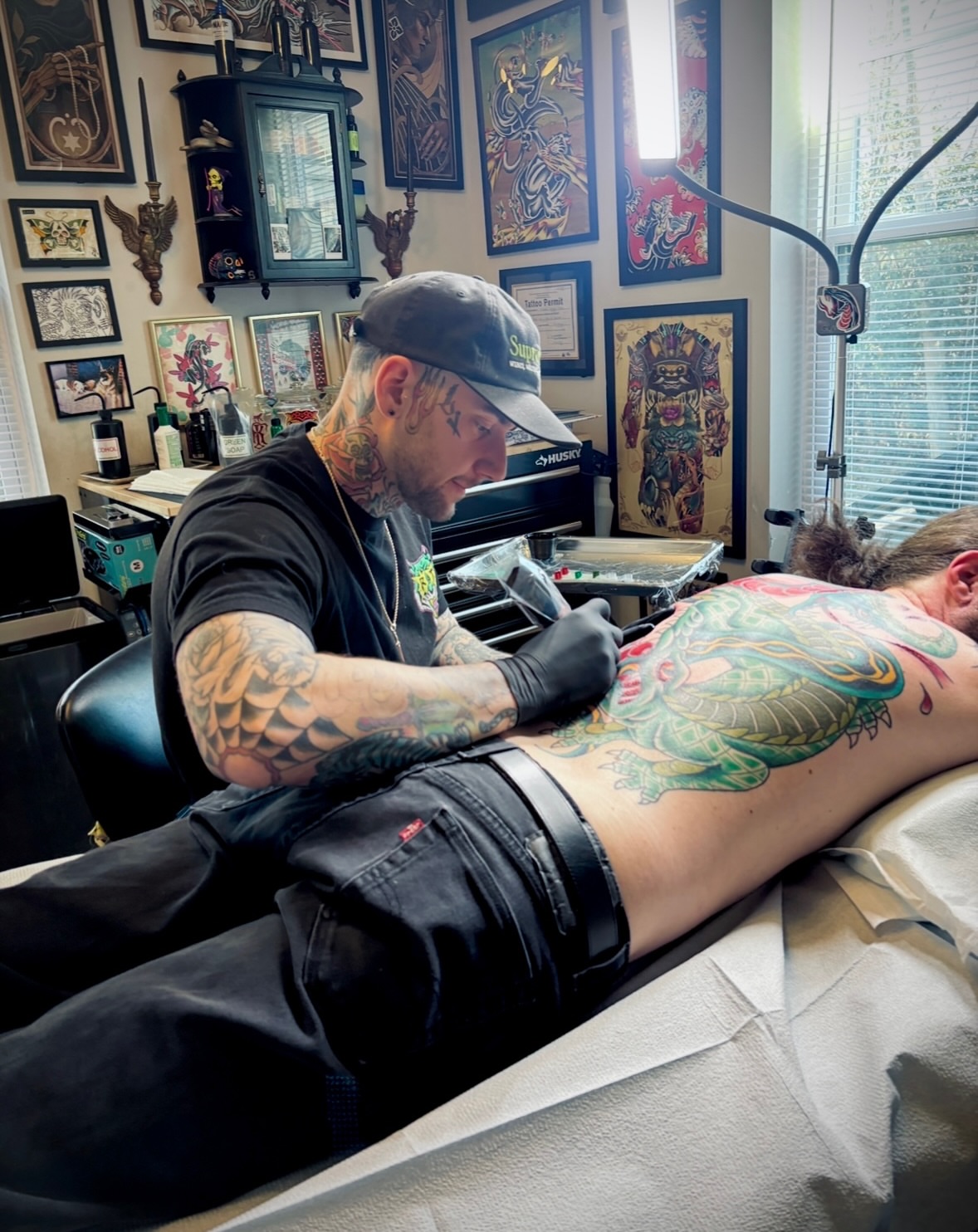 Dragon American traditional tattoo on the back by Mickey Putillo, Charlotte, North Carolina