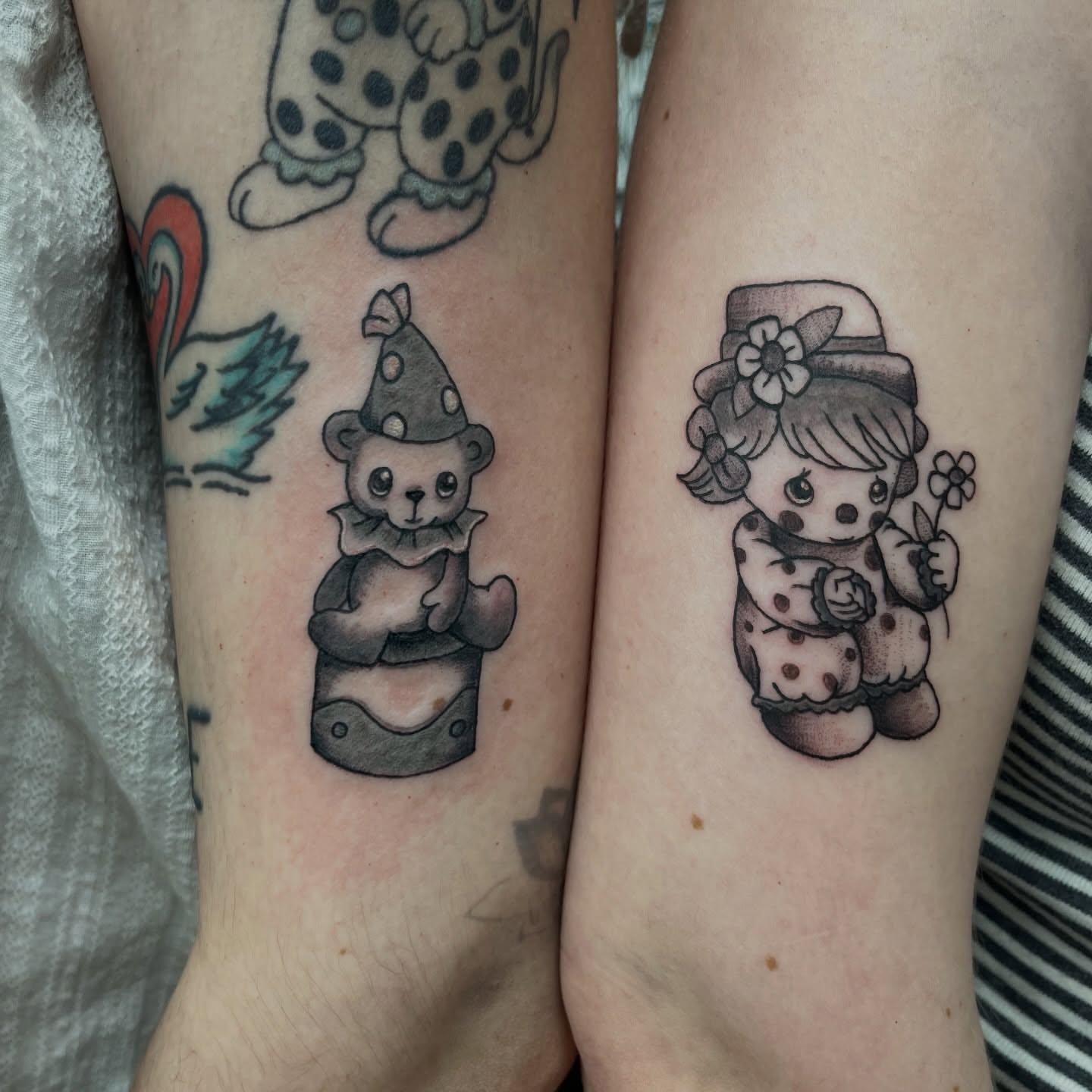 Clown bear and girl black and grey tattoo on the forearm by c☮︎urt