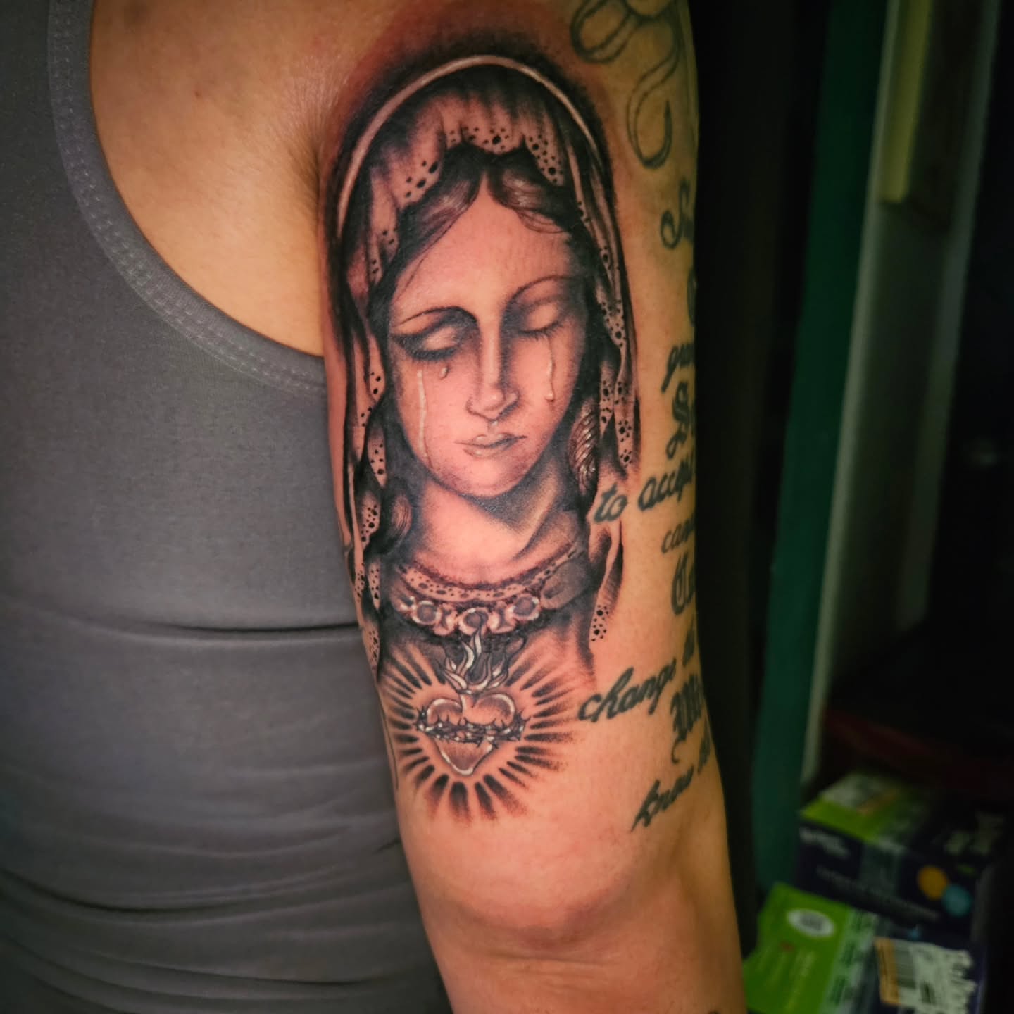 Religious figure realism tattoo on the forearm by Ari🖤