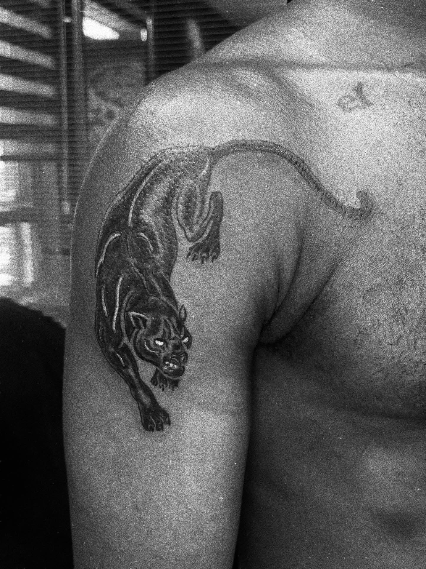 Tattoo by @allthings_comix — black_and_grey