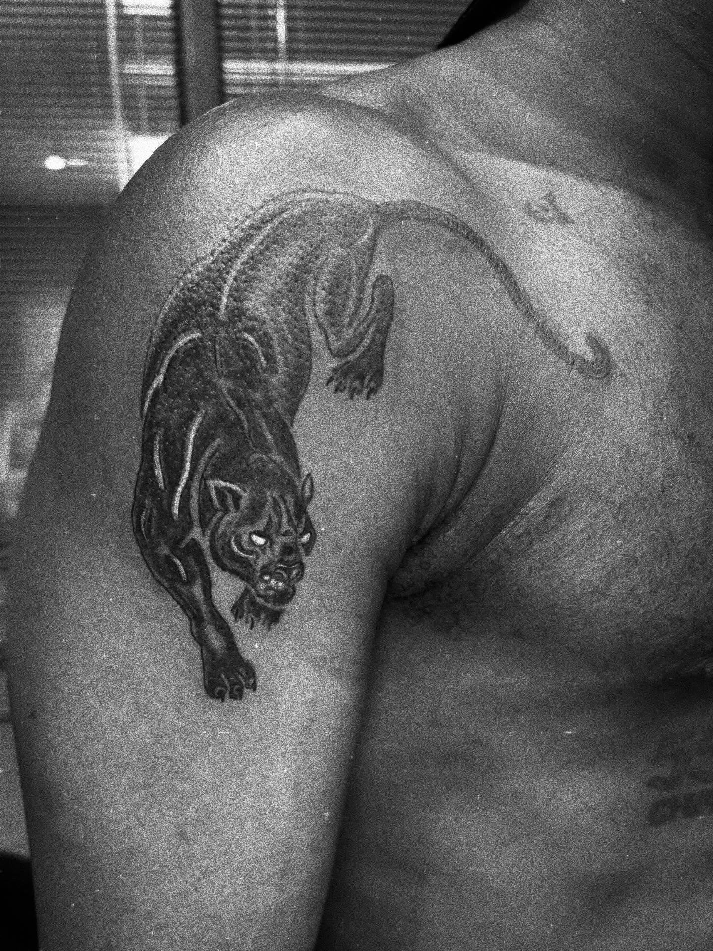 Tattoo by @allthings_comix — black_and_grey