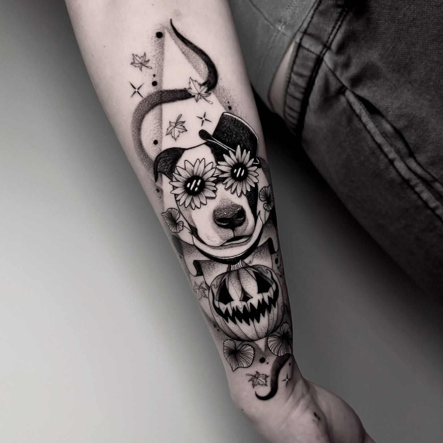 Dog with sunflowers dotwork tattoo on the forearm by ɪᴠᴏɴɴᴇ