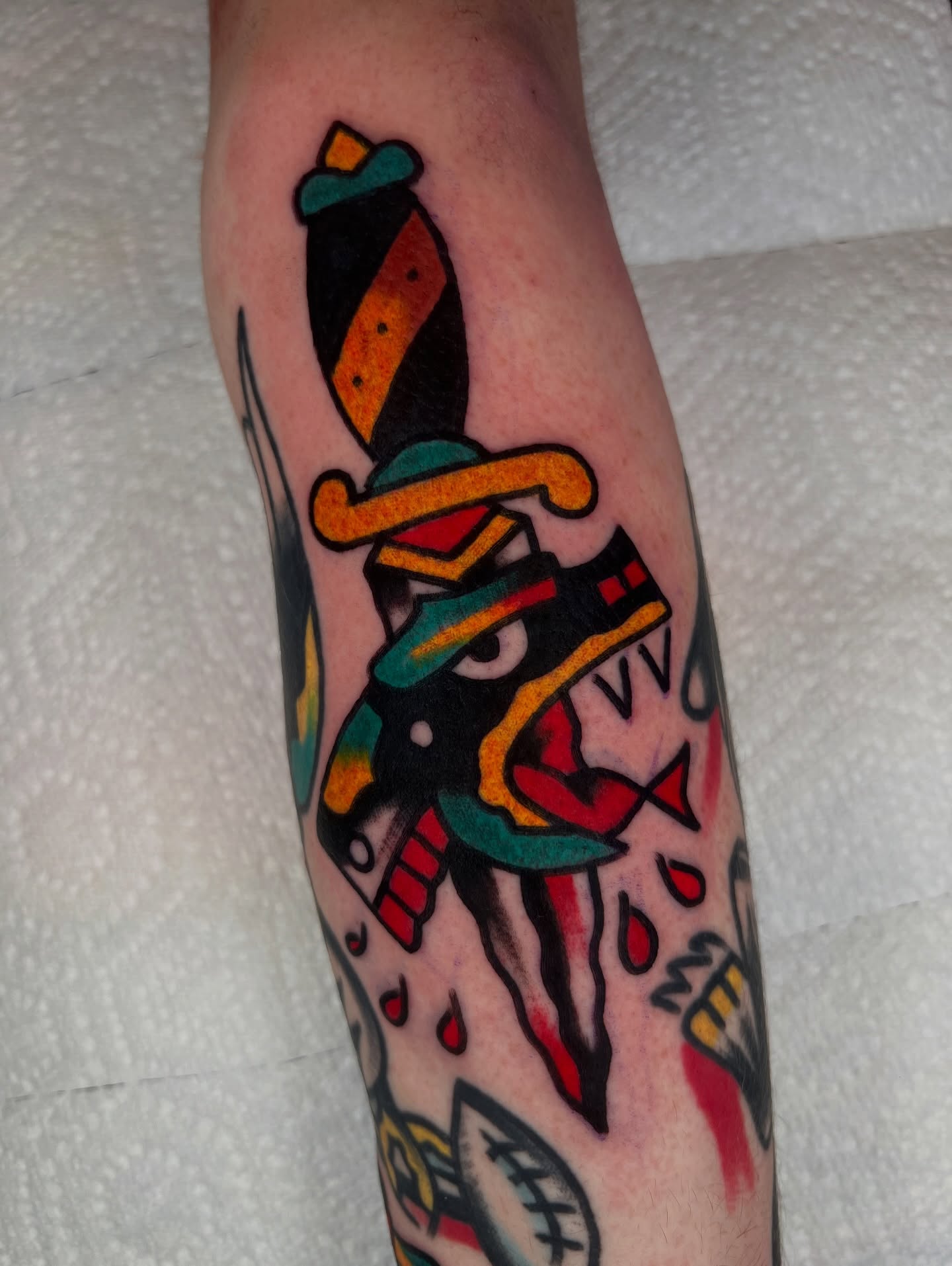 Mask American traditional tattoo on the forearm by Like A Horse Corral