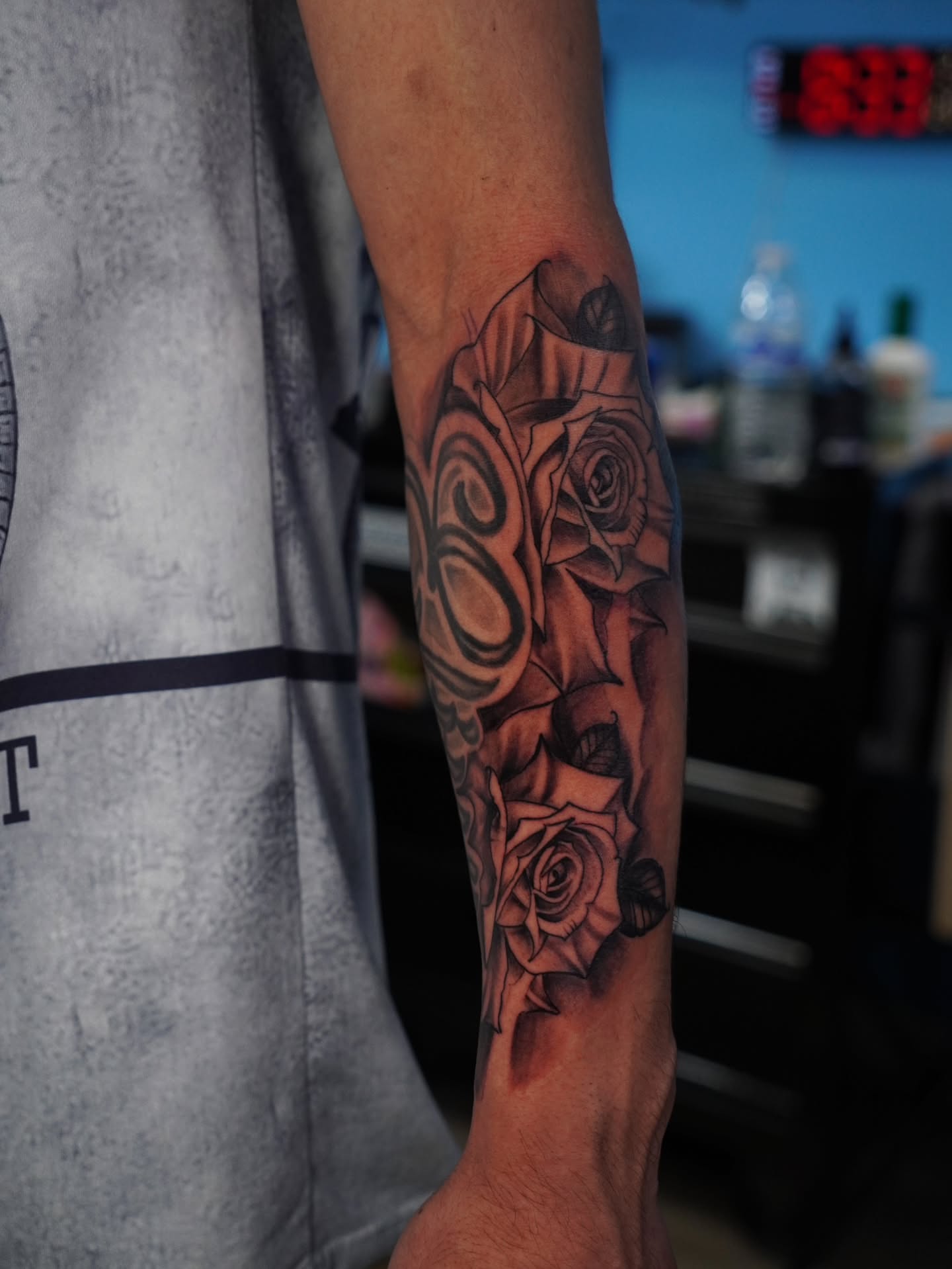 Roses black and grey tattoo on the forearm by @tattoobytats