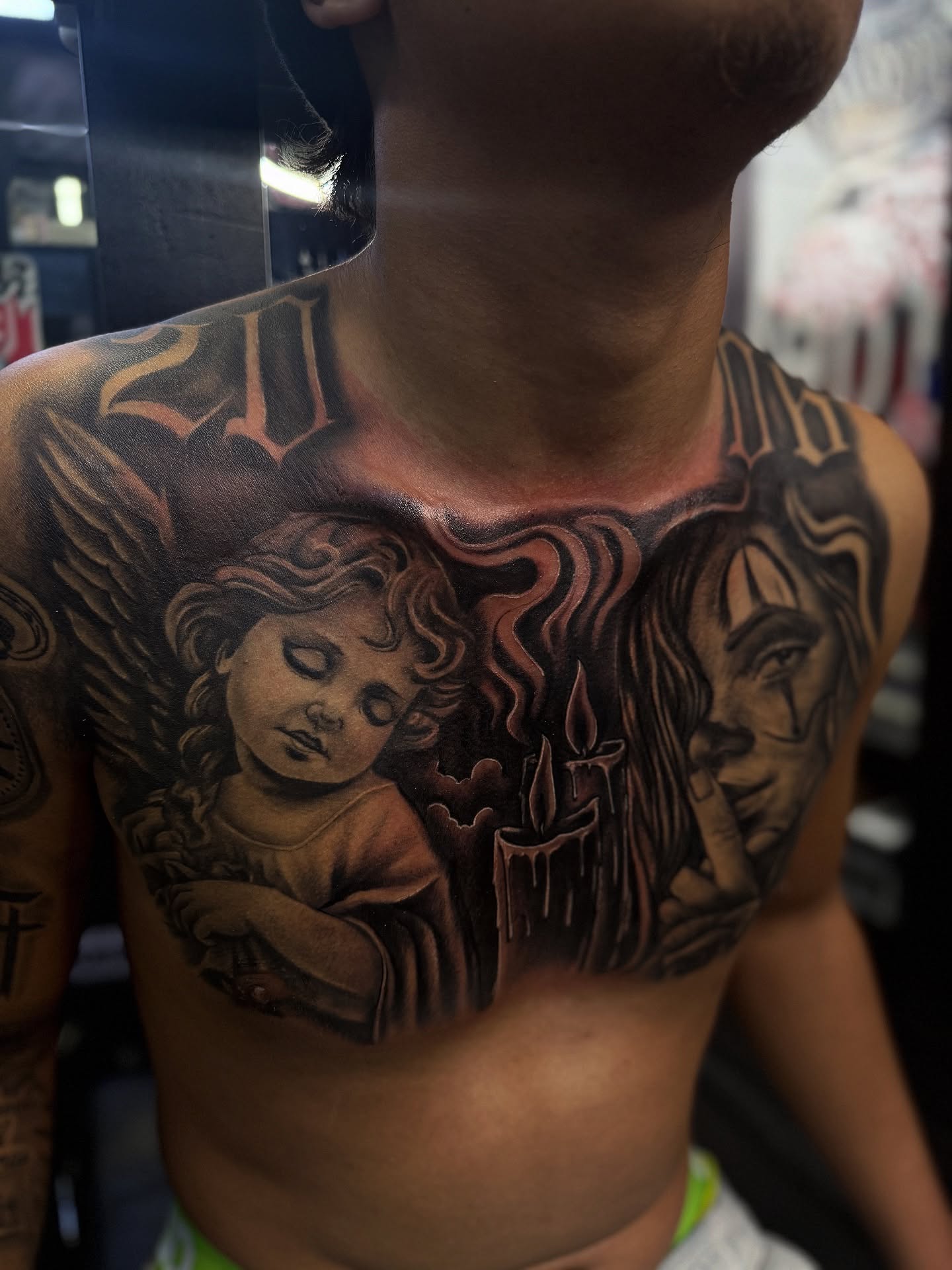 Angel and woman American traditional tattoo on the chest by @samg_tat2s, San Diego, California