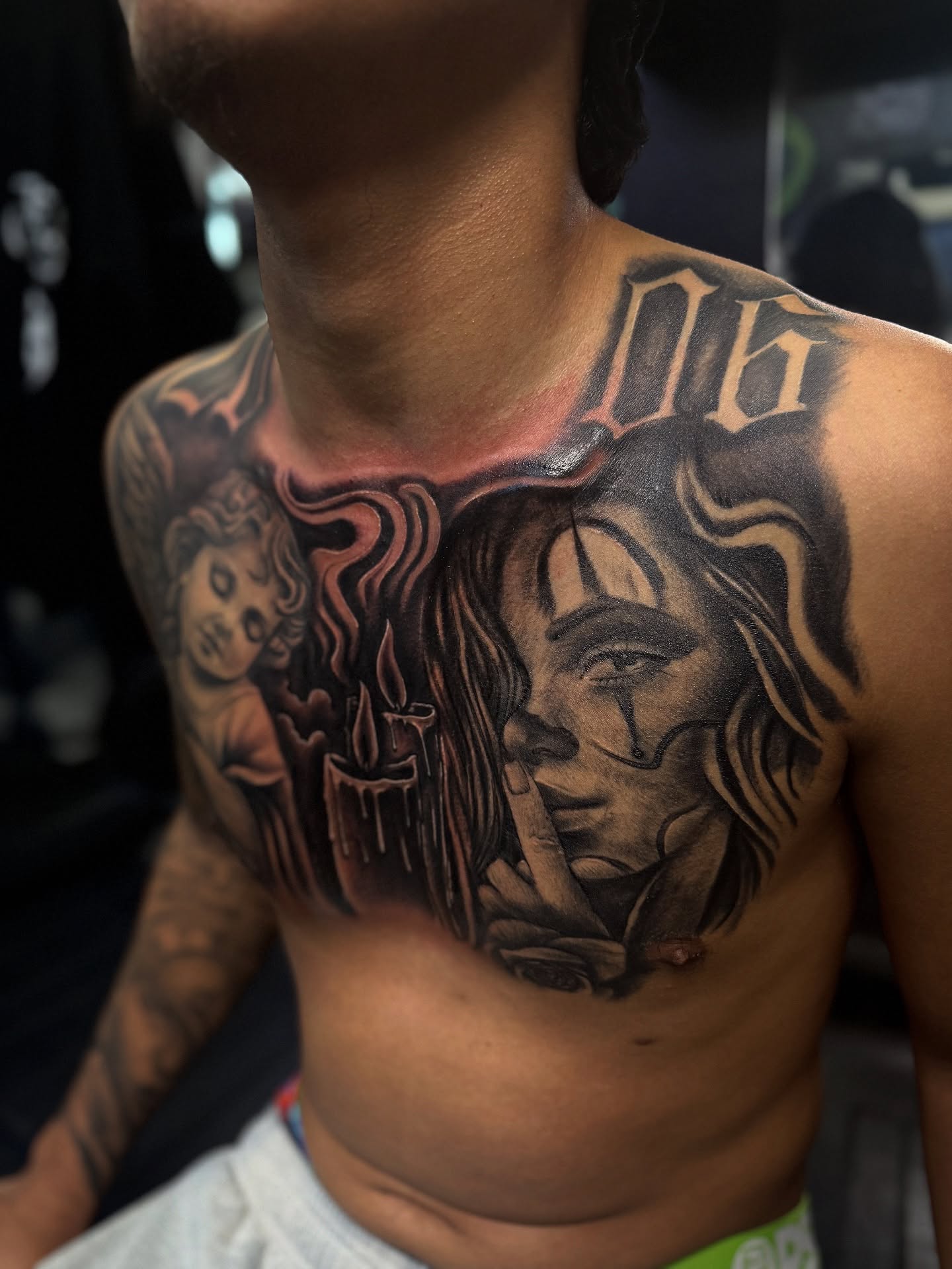 Woman with candle realism tattoo on the chest by @samg_tat2s, San Diego, California