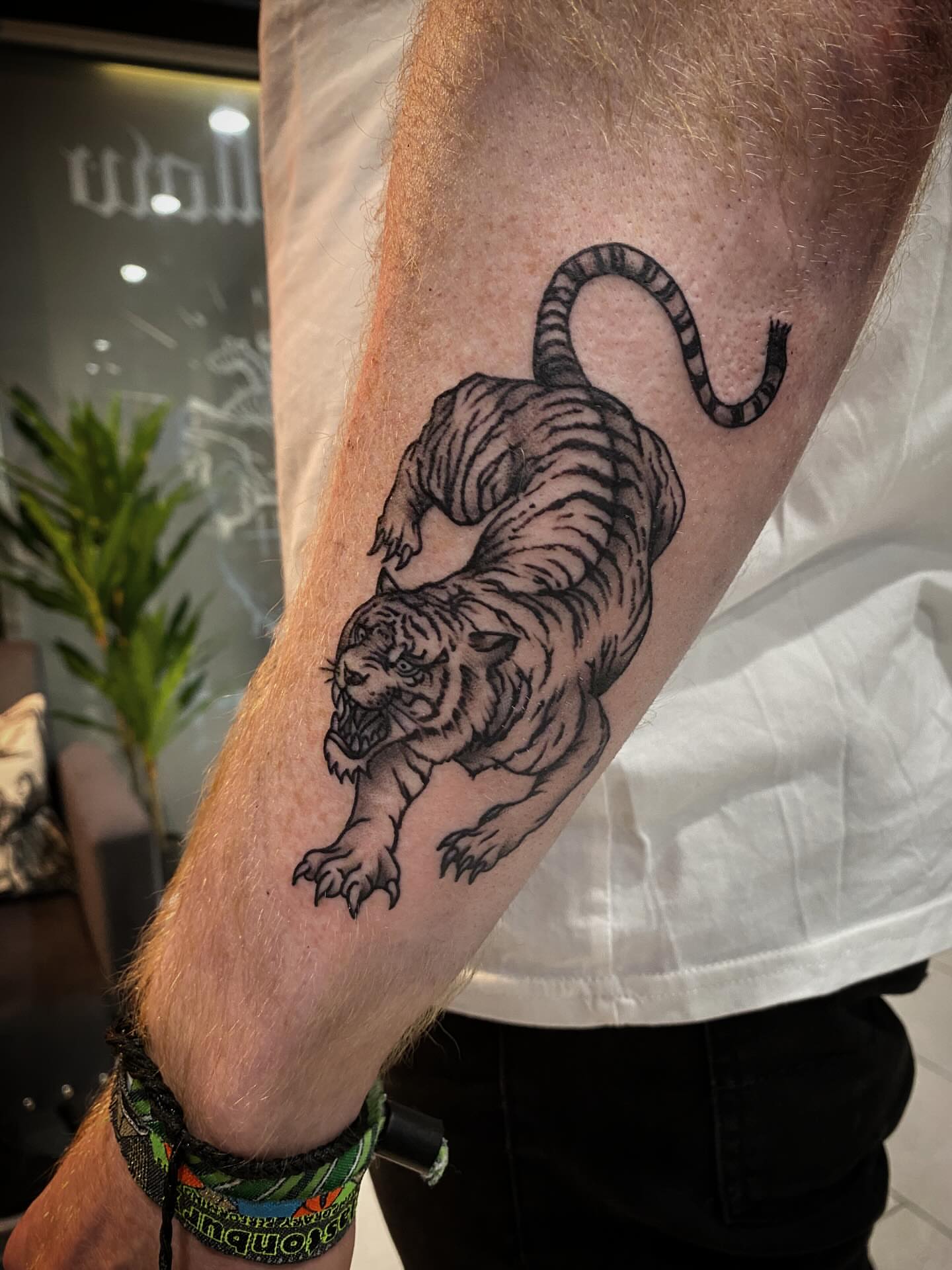 Tattoo by @chrisdafacetattoo — black_and_grey