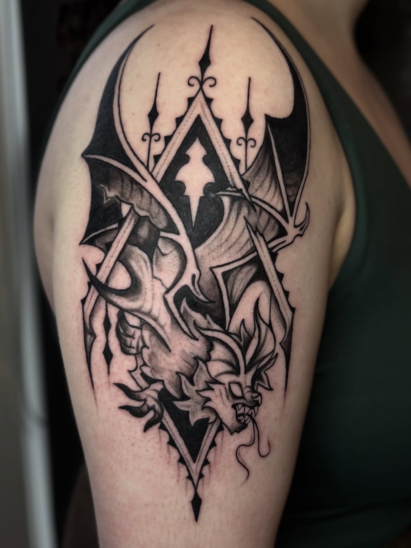 Dragon geometric tattoo on the shoulder by ๐ฅ Jas ๐ฅ