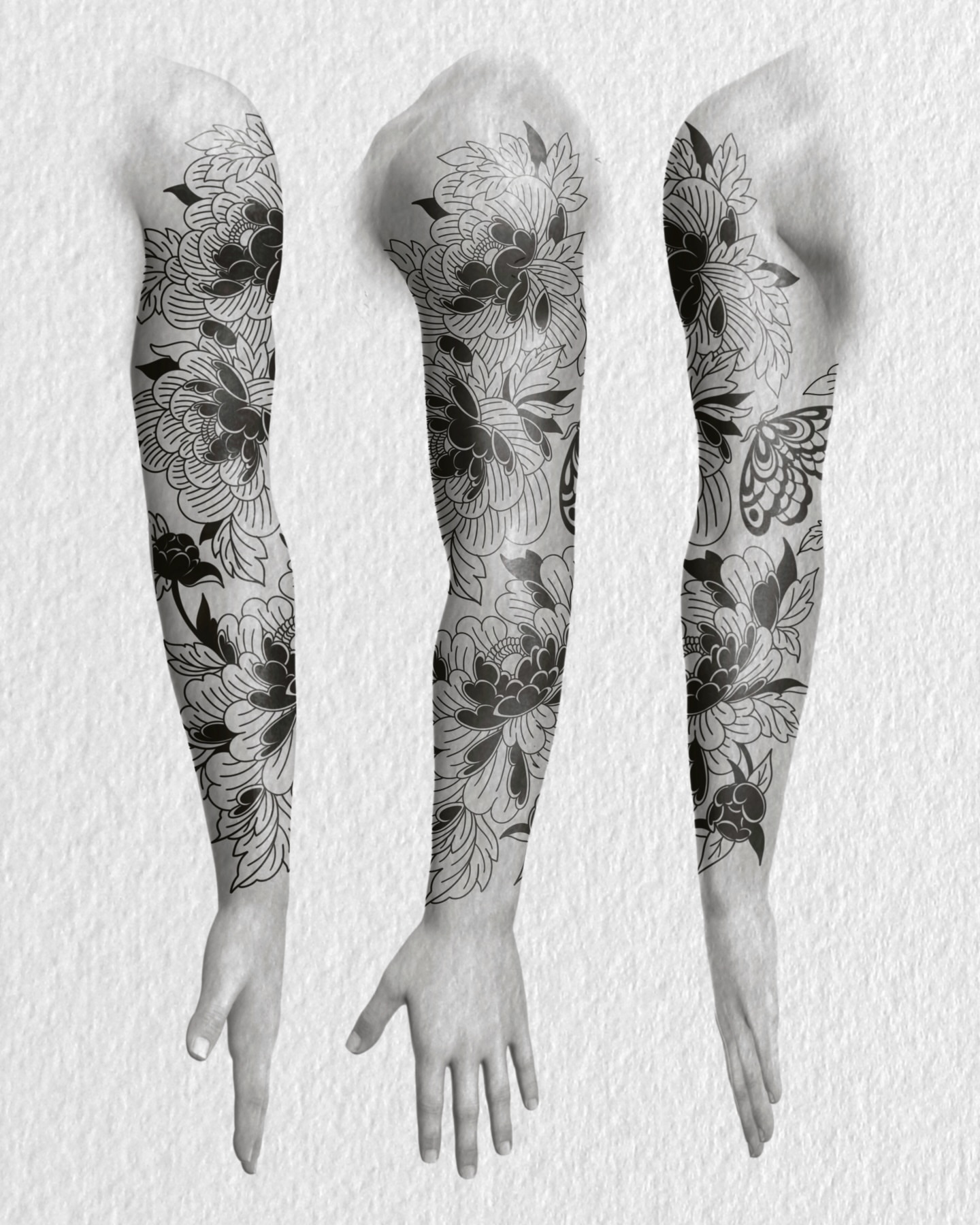 Floral pattern black and grey tattoo on the upper arm by R e N O T