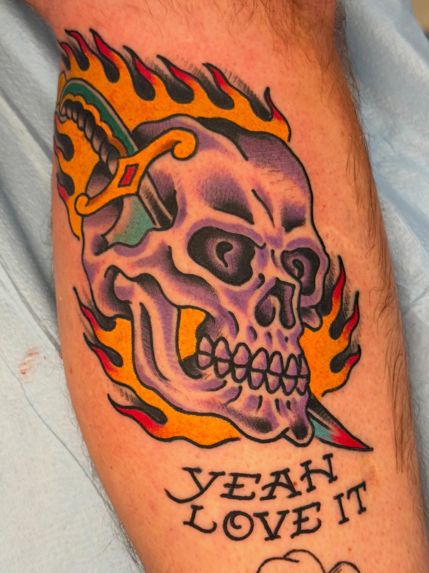 Flaming skull American traditional tattoo on the forearm by David Steed, Dallas, Texas