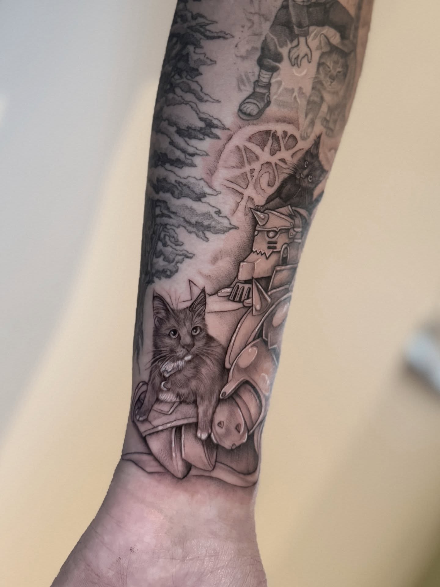 Cat and mechanical elements realism tattoo on the forearm by Lynx, Cincinnati, Ohio