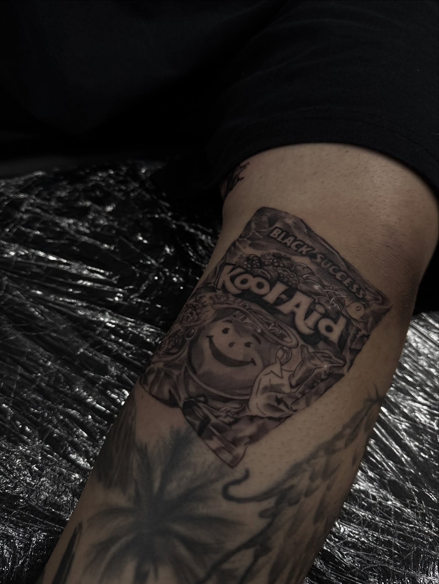 Kool-Aid man black and grey tattoo on the forearm by R O M y R I N C Ó N
