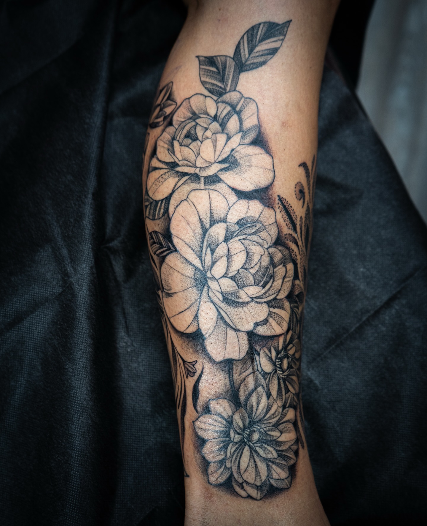 Flowers realism tattoo on the forearm by Lauren klose, Fort Myers, Florida