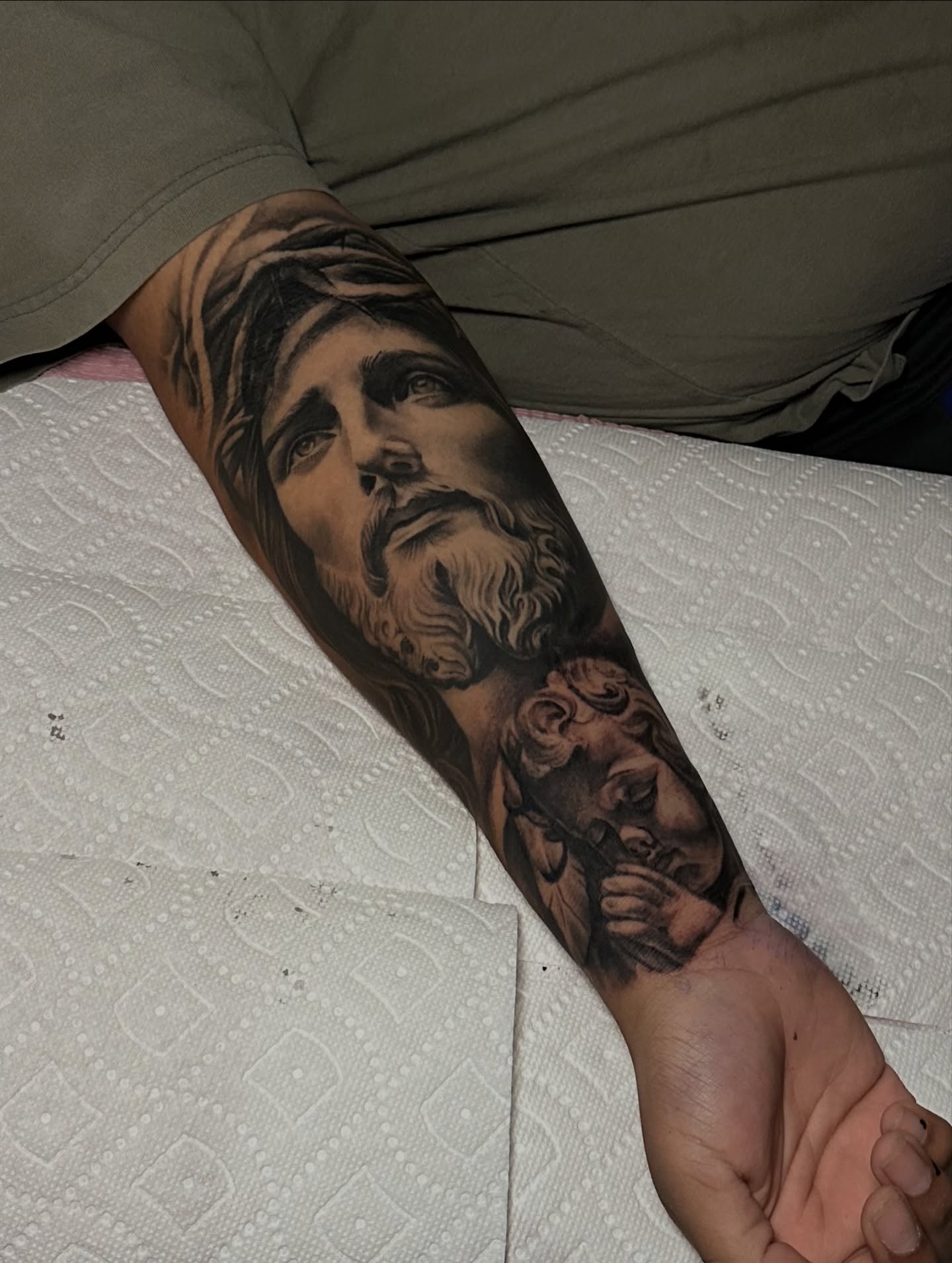 Religious figure realism tattoo on the forearm by Lex⛓️