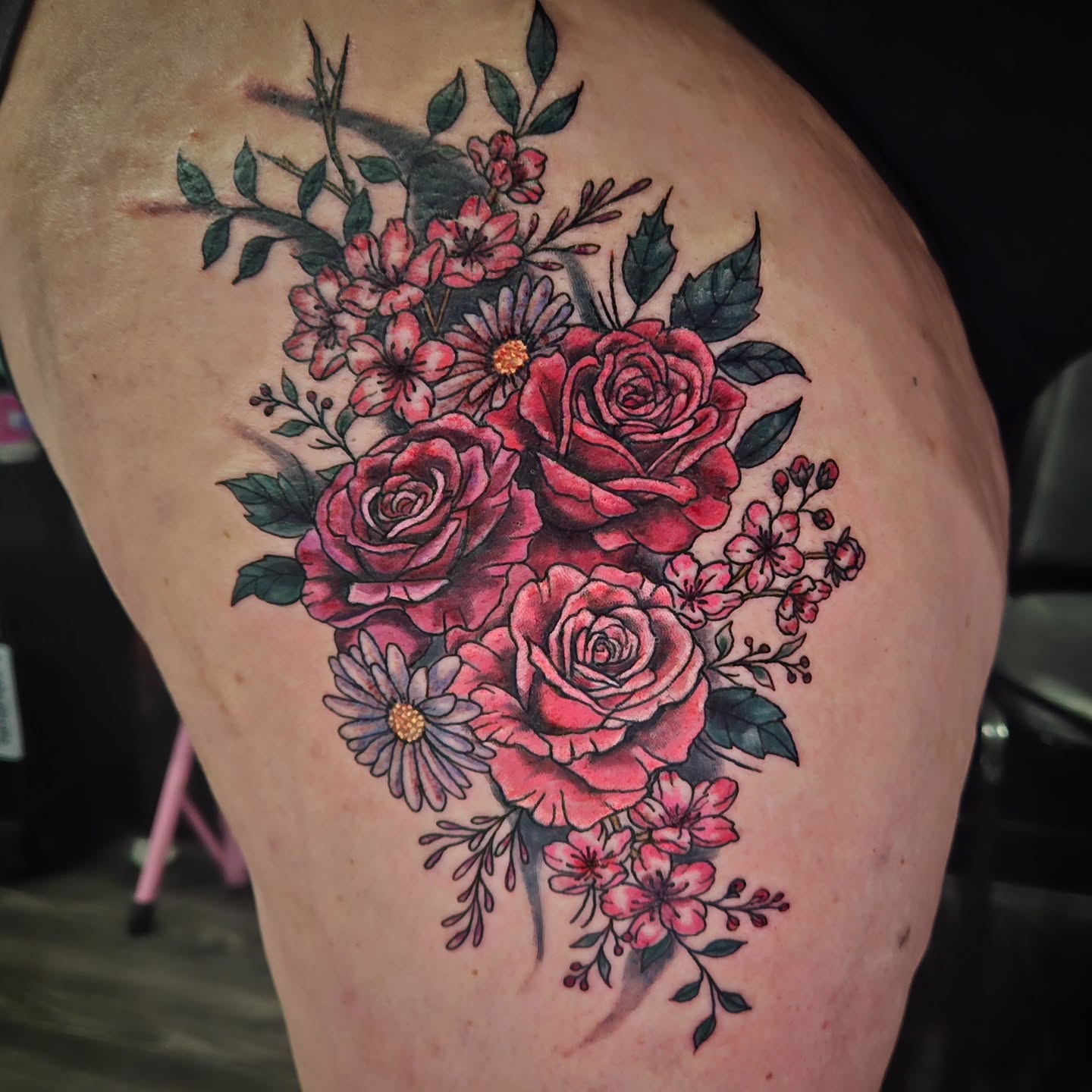Flower bouquet realism tattoo on the thigh by Angie Griffith 🥰, Glendale, Arizona