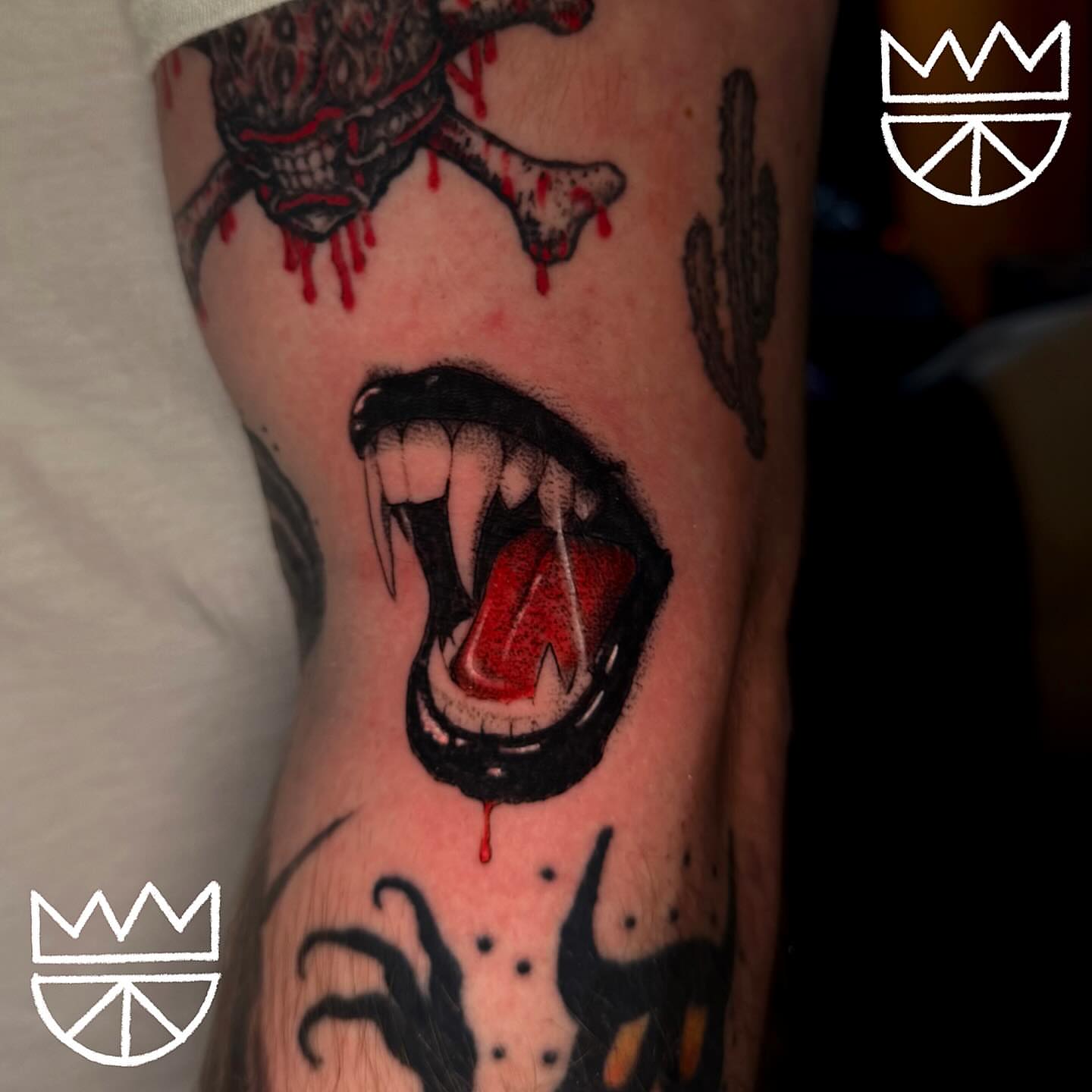 Fangs and blood realism tattoo on the forearm by Prncjordn, Stallings, North Carolina
