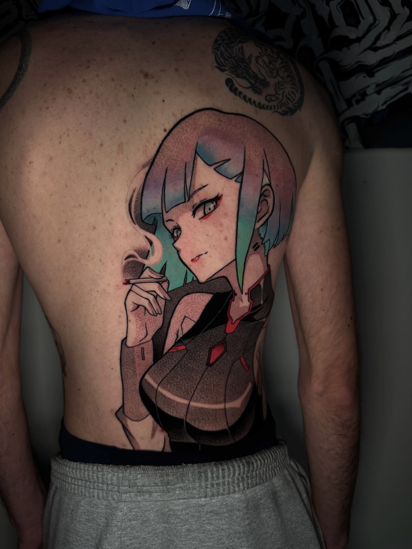 Anime character anime tattoo on the back by Anthony D. Rustik