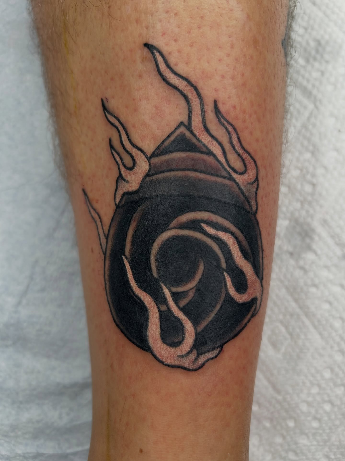 Rose black and grey tattoo on the forearm by Mike "Yogi" Trube