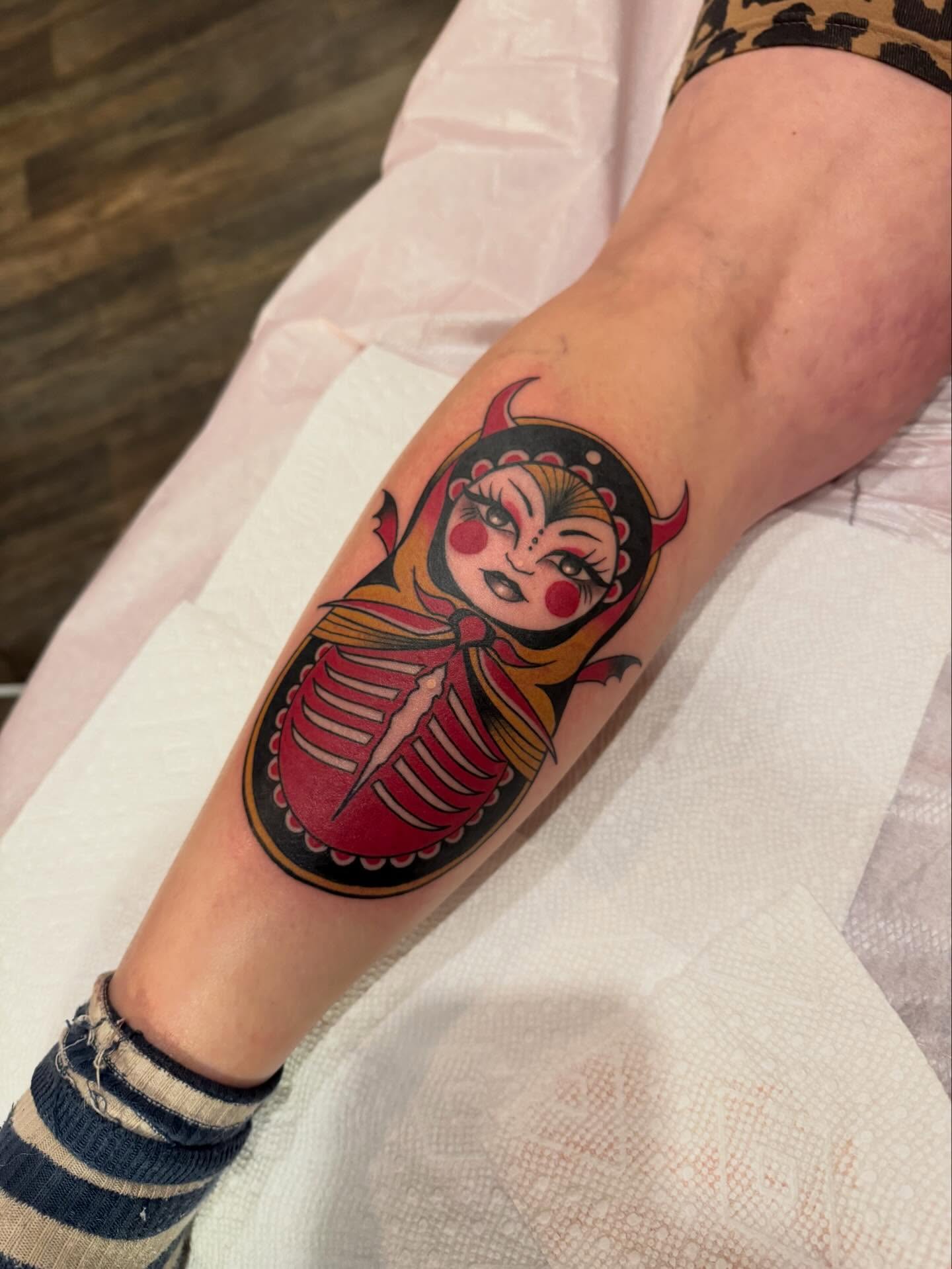 Russian nesting doll American traditional tattoo on the forearm by Paul Giovis