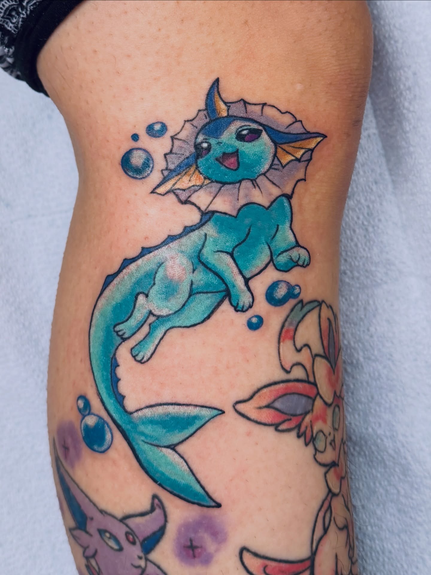 Aquatic dragon new school tattoo on the forearm by Breanna Fraielli