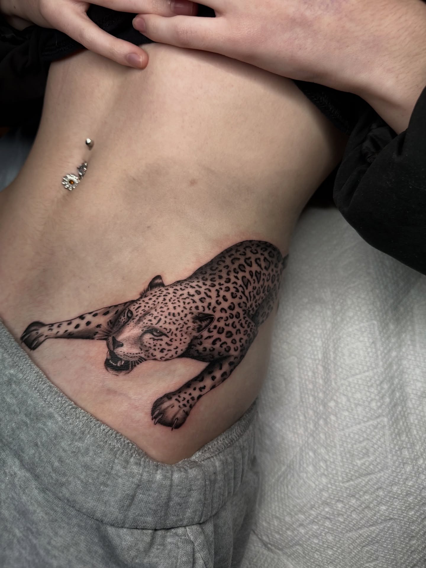 Leopard realism tattoo on the ribs by Tat by Brendan