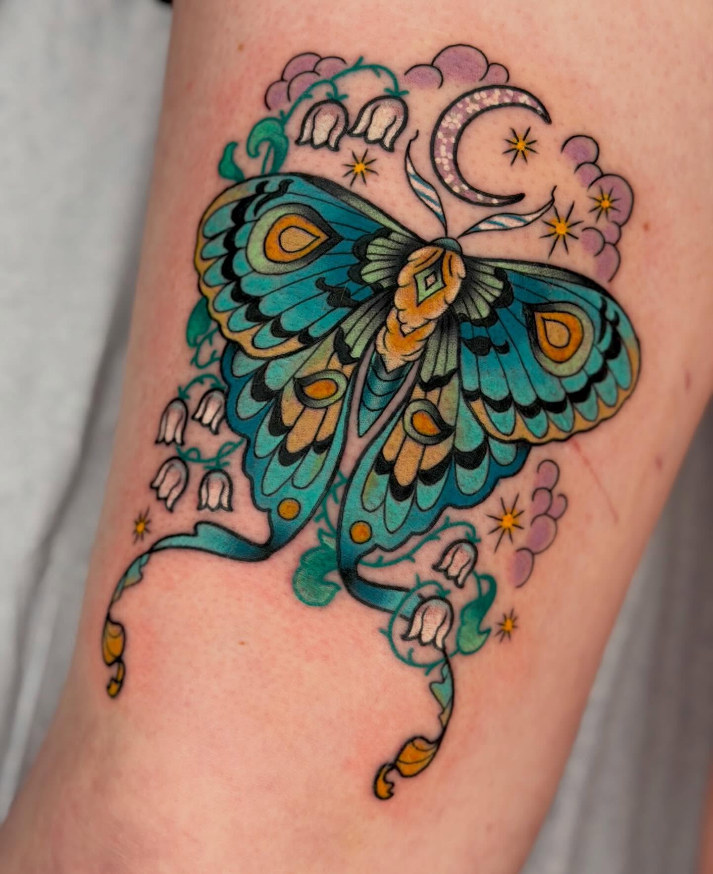 Butterfly new school tattoo on the forearm by Beeker, Bellingham, Washington