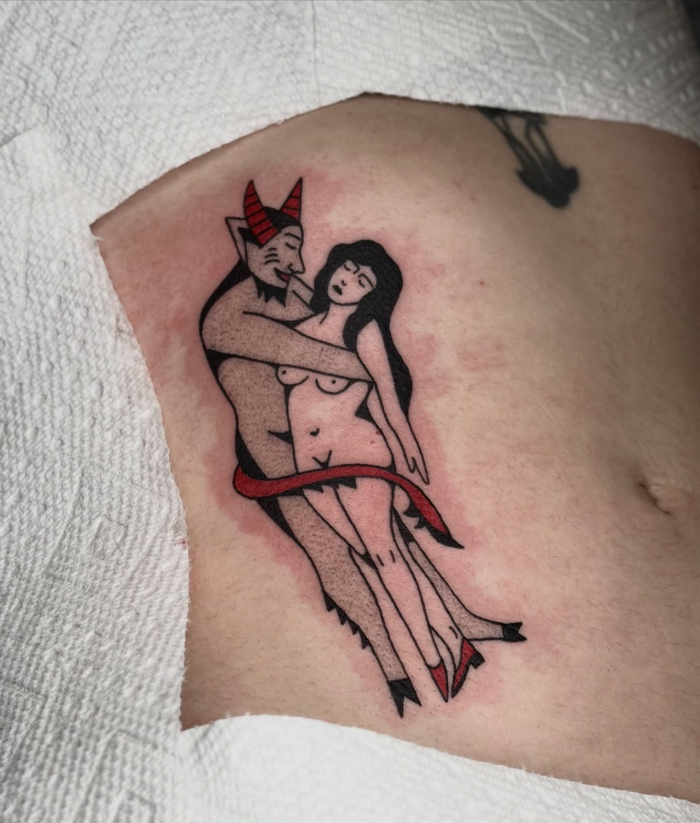 Demon and woman American traditional tattoo on the thigh by Maks