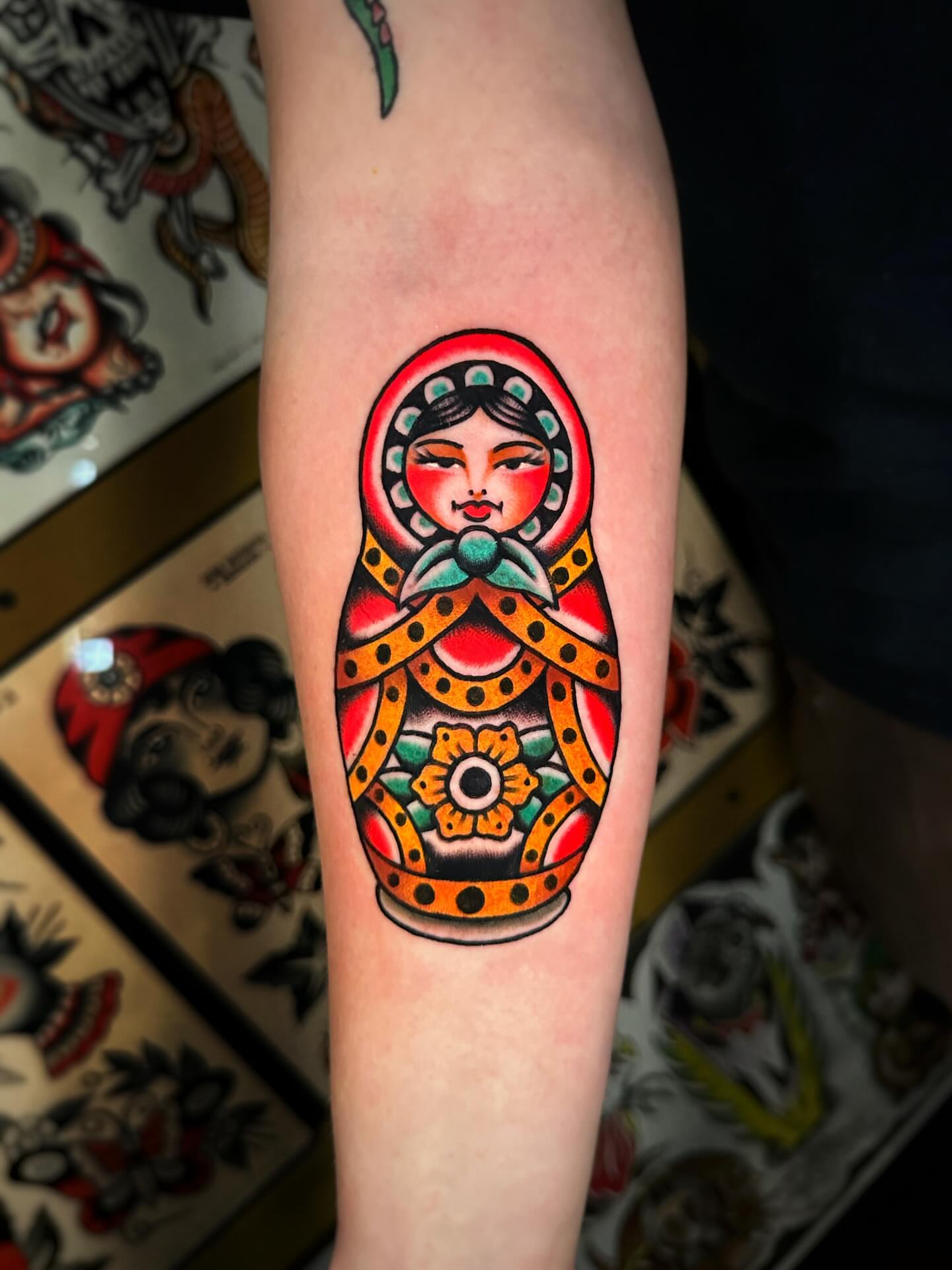 Matryoshka doll American traditional tattoo on the forearm by Alex Finnerty, Reading, Massachusetts