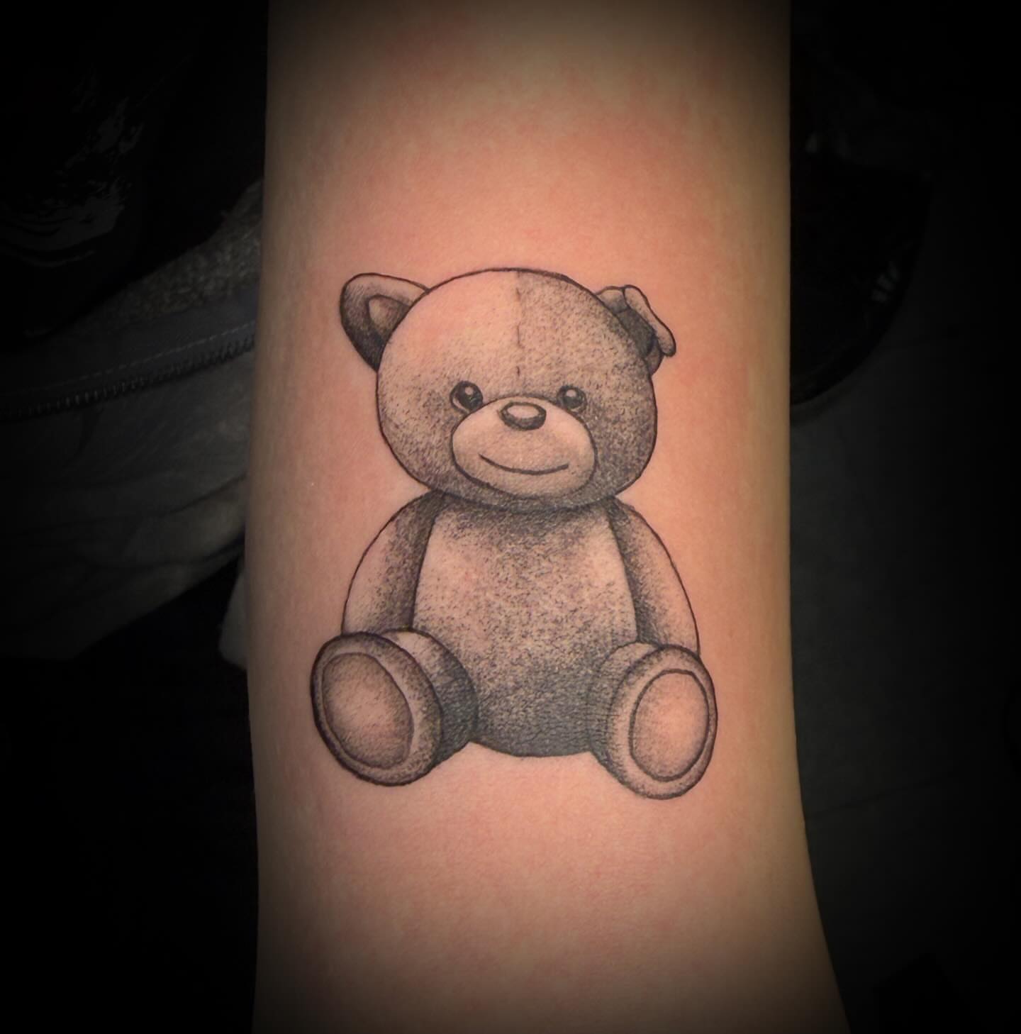 Teddy bear dotwork tattoo on the forearm by sᴋᴇᴛᴄʜᴇᴅ