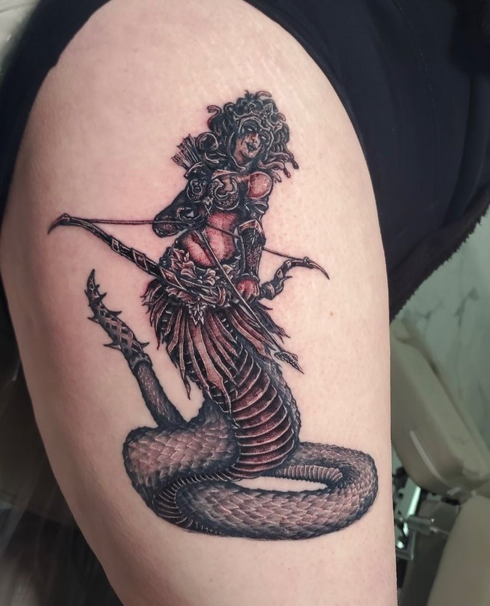 Mermaid warrior realism tattoo on the thigh by Matthew Ray, Harrisburg, North Carolina