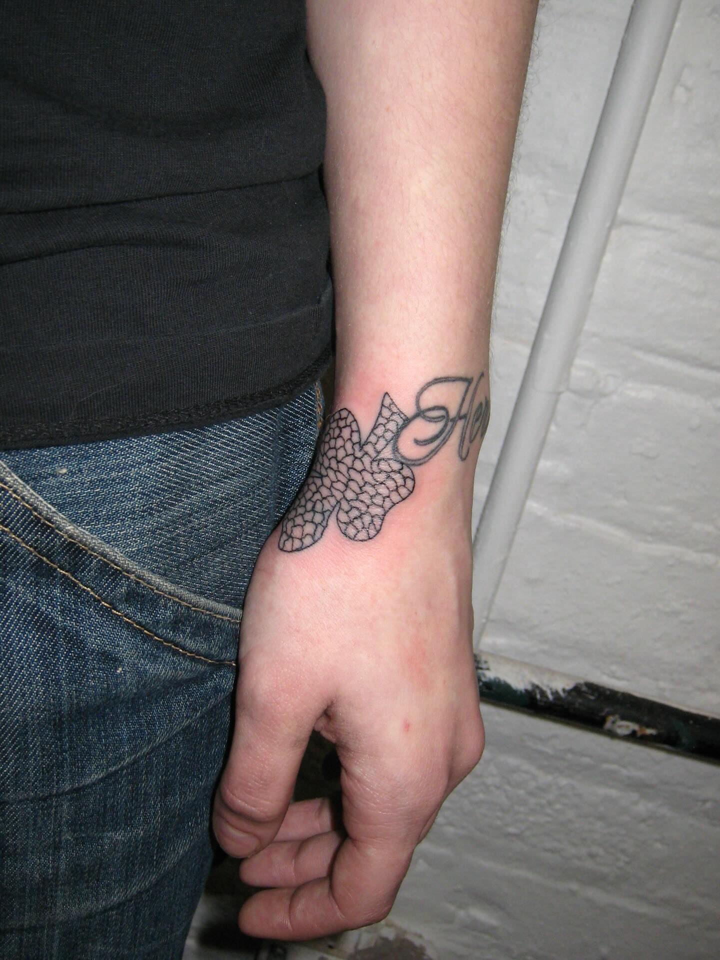 Butterfly geometric tattoo on the forearm by jonatan