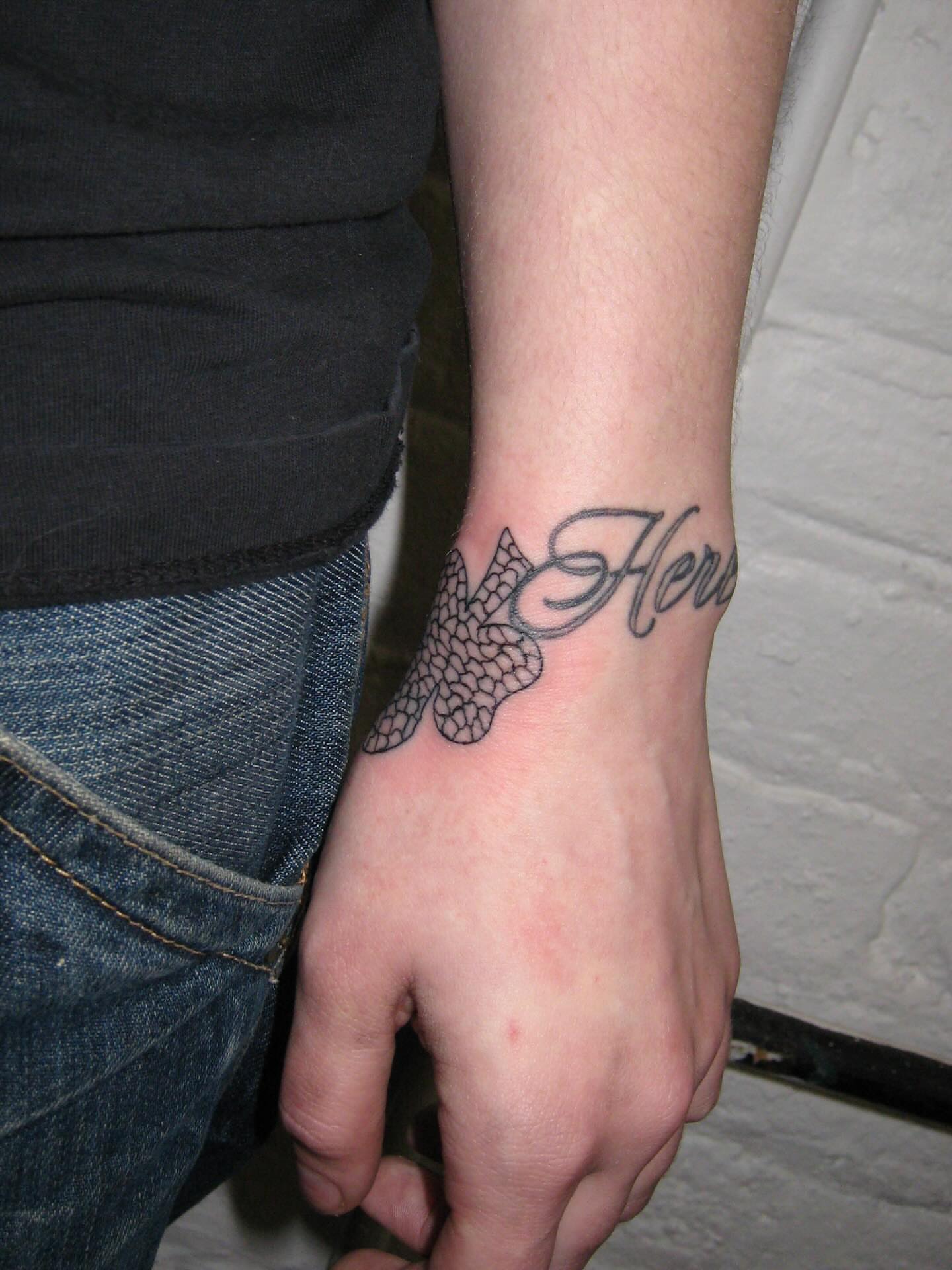 Her lettering script tattoo on the forearm by jonatan