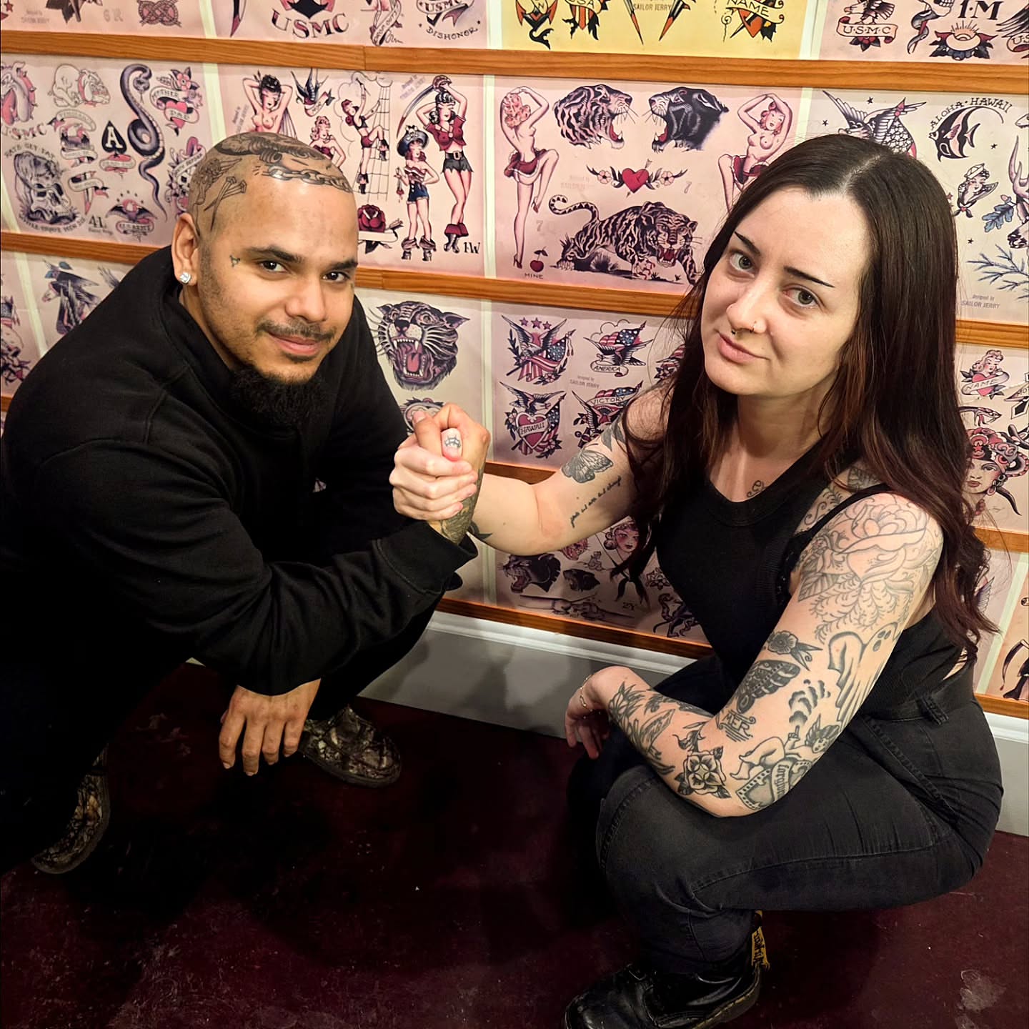 Tattooed arm American traditional tattoo on the upper arm by Kat Coniglio Art