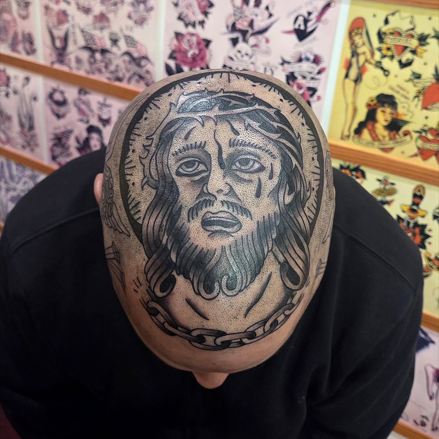 Religious figure American traditional tattoo on the head by Kat Coniglio Art