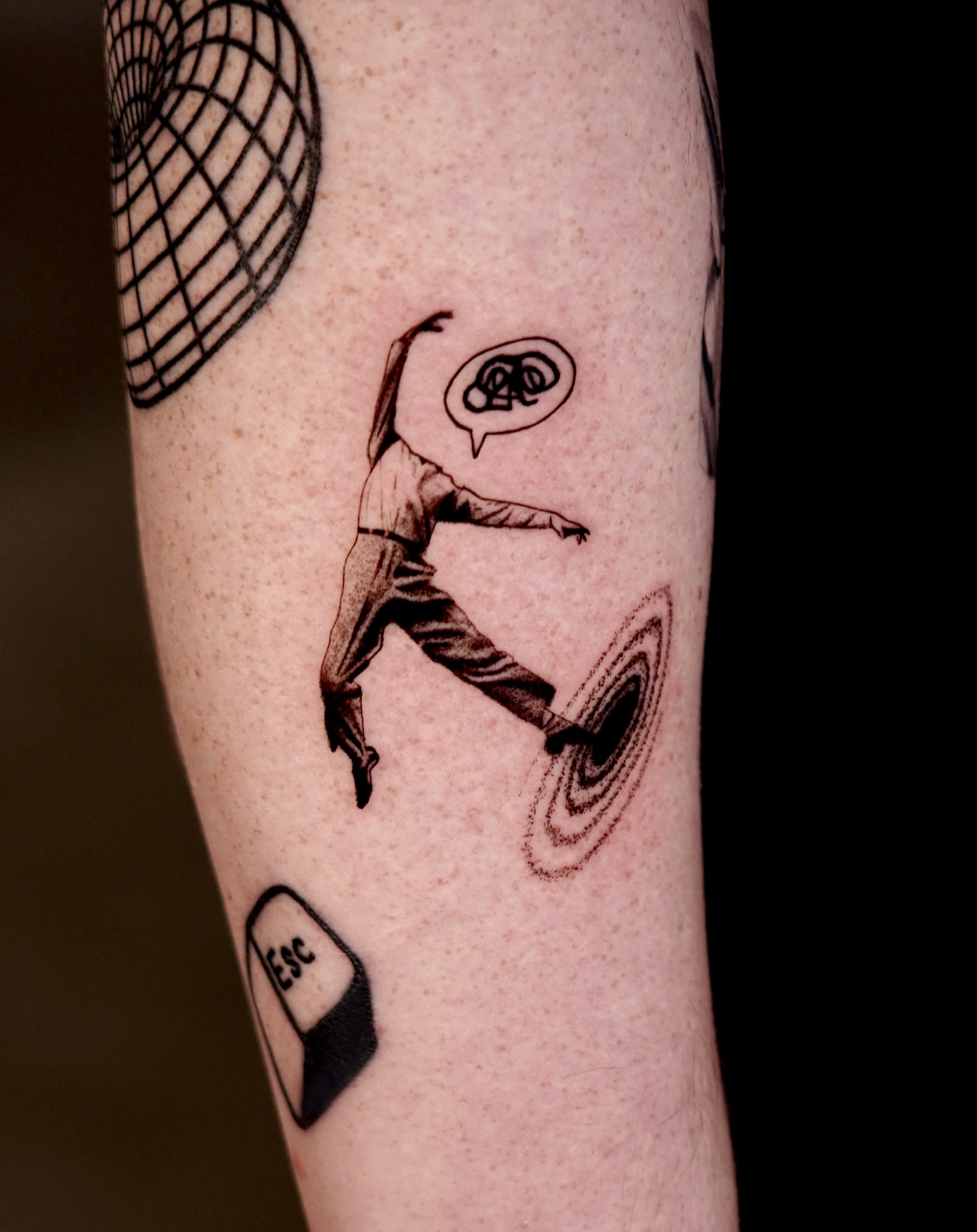Escape black and grey tattoo on the forearm by Metin Karaatli