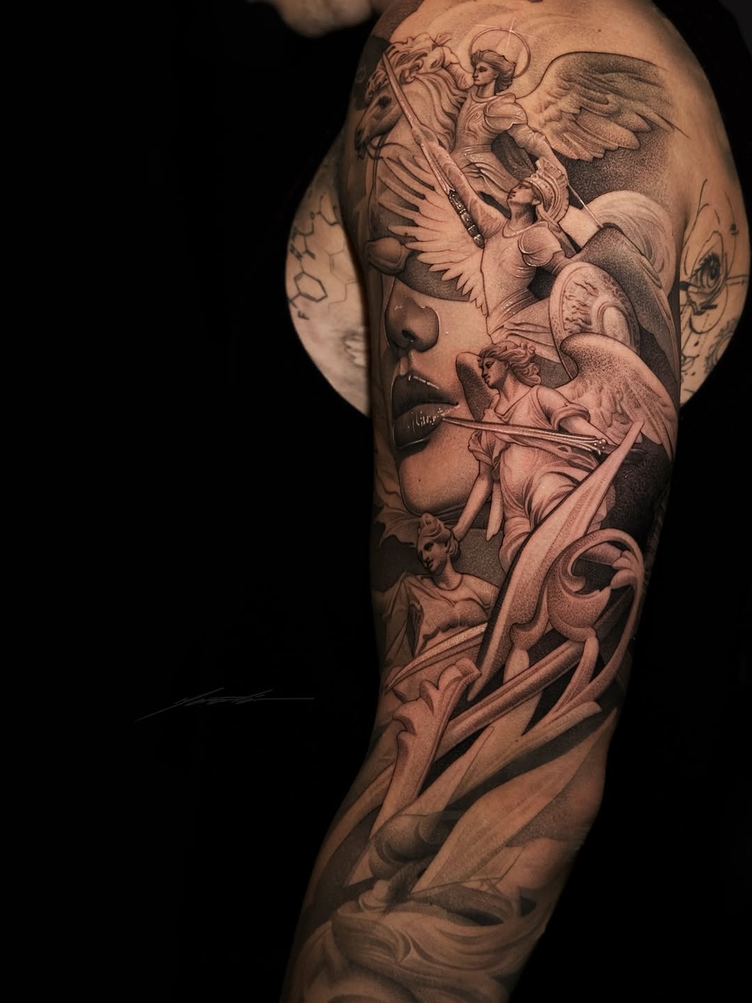 Angelic figures and a face realism tattoo on the forearm by Ke$la
