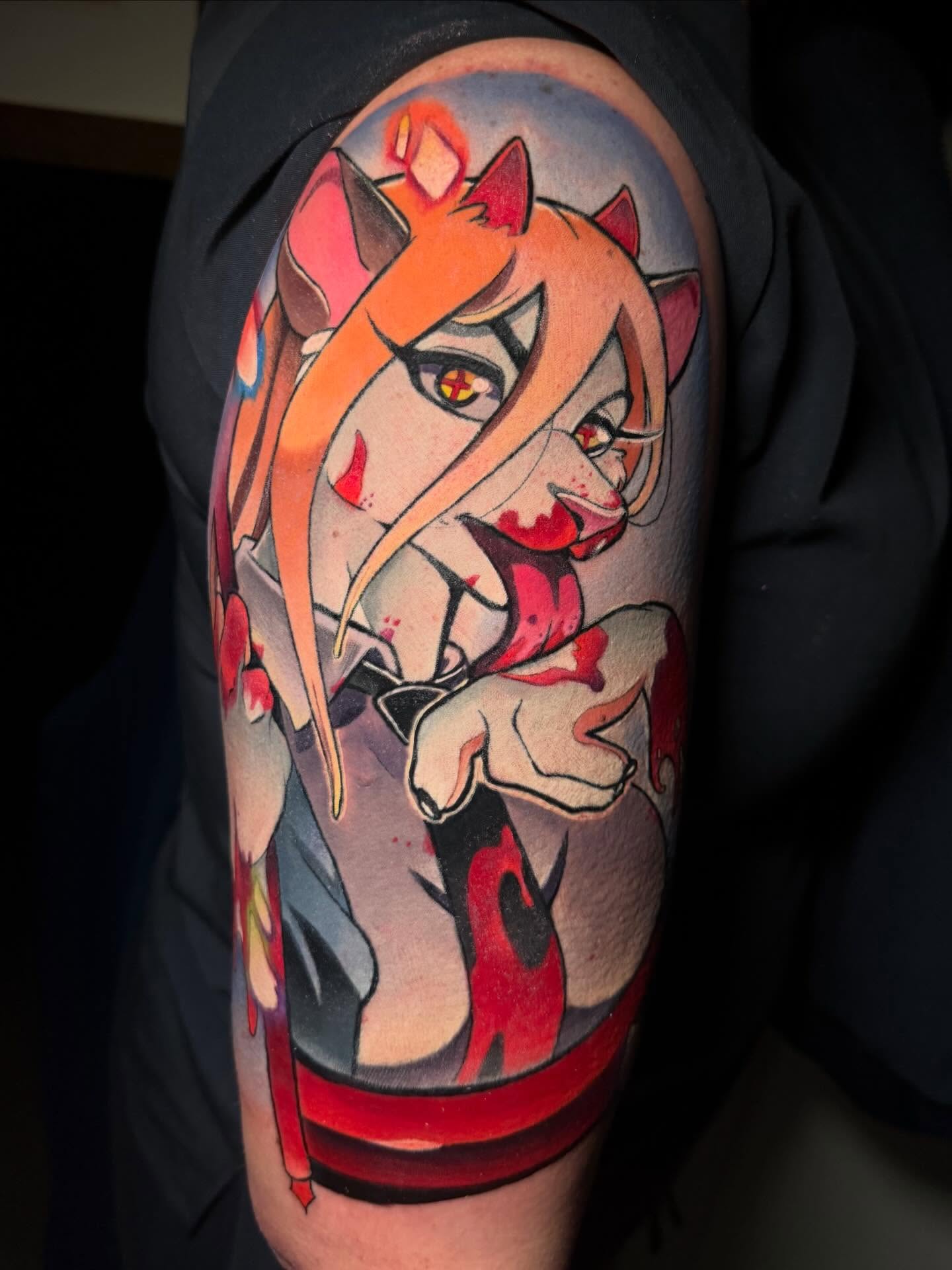 Anime character anime tattoo on the upper arm by Kenneth Ruiz