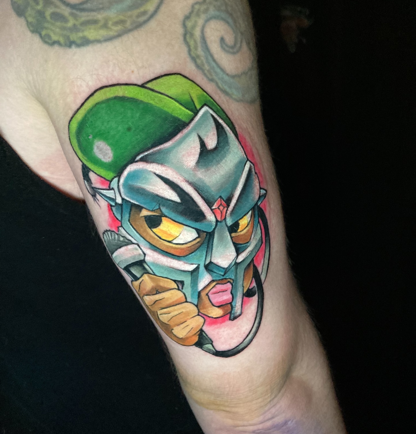 Mask character anime tattoo on the forearm by Eathan Hale-(East TN) Newschool Tattoo Artist