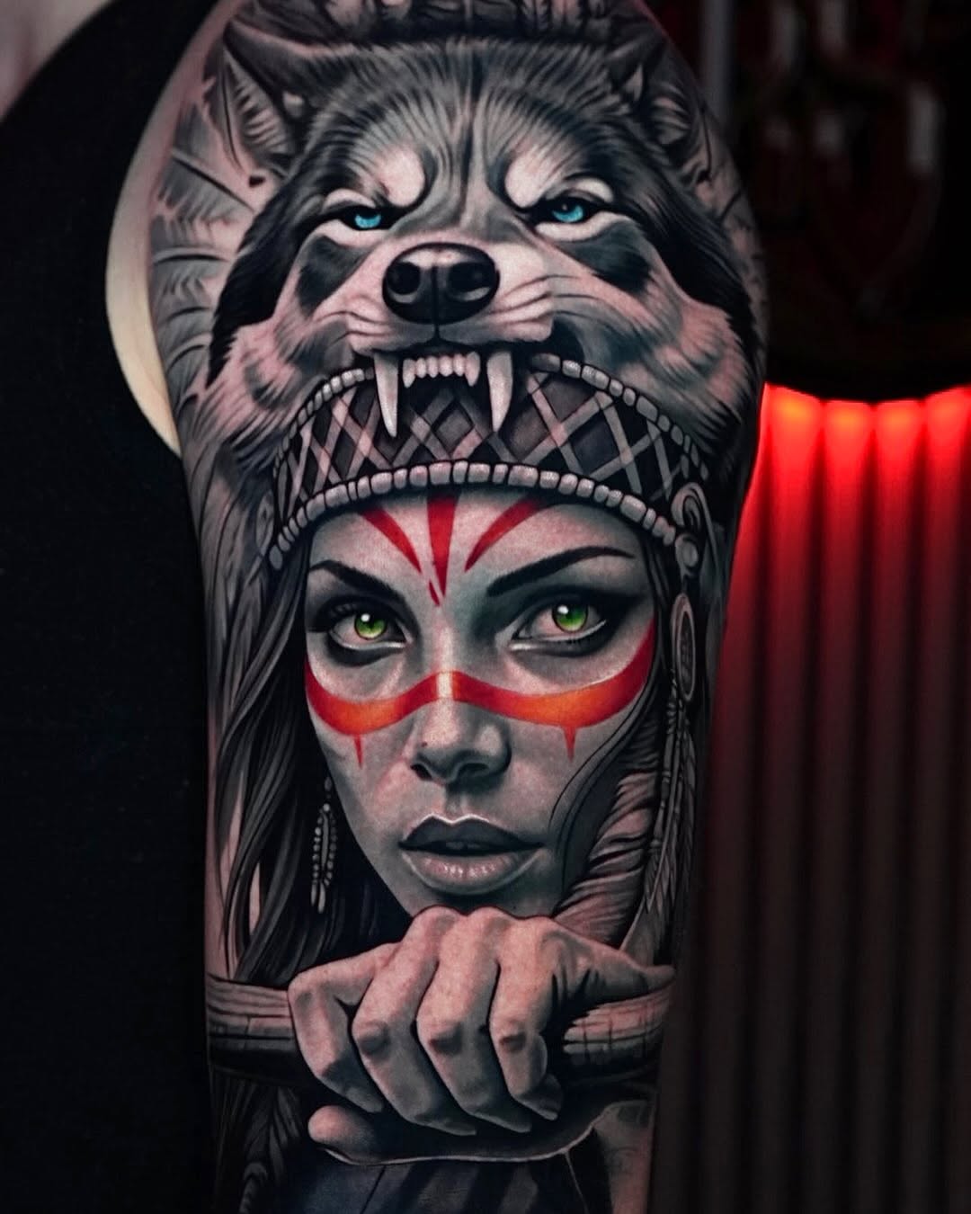 Woman with wolf headdress realism tattoo on the forearm by Sadier Alfonso