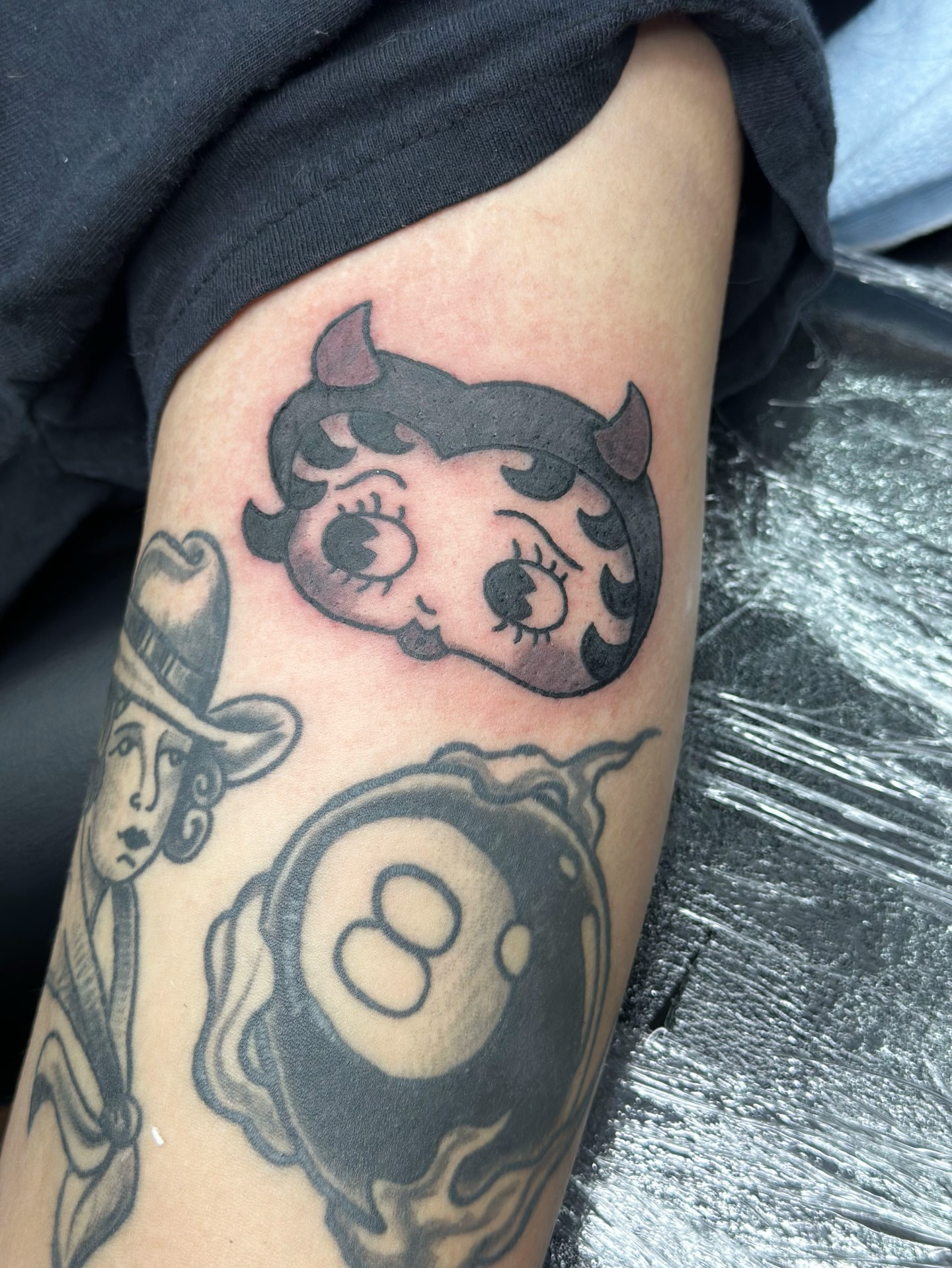 Betty Boop American traditional tattoo on the thigh by Lucy Jay