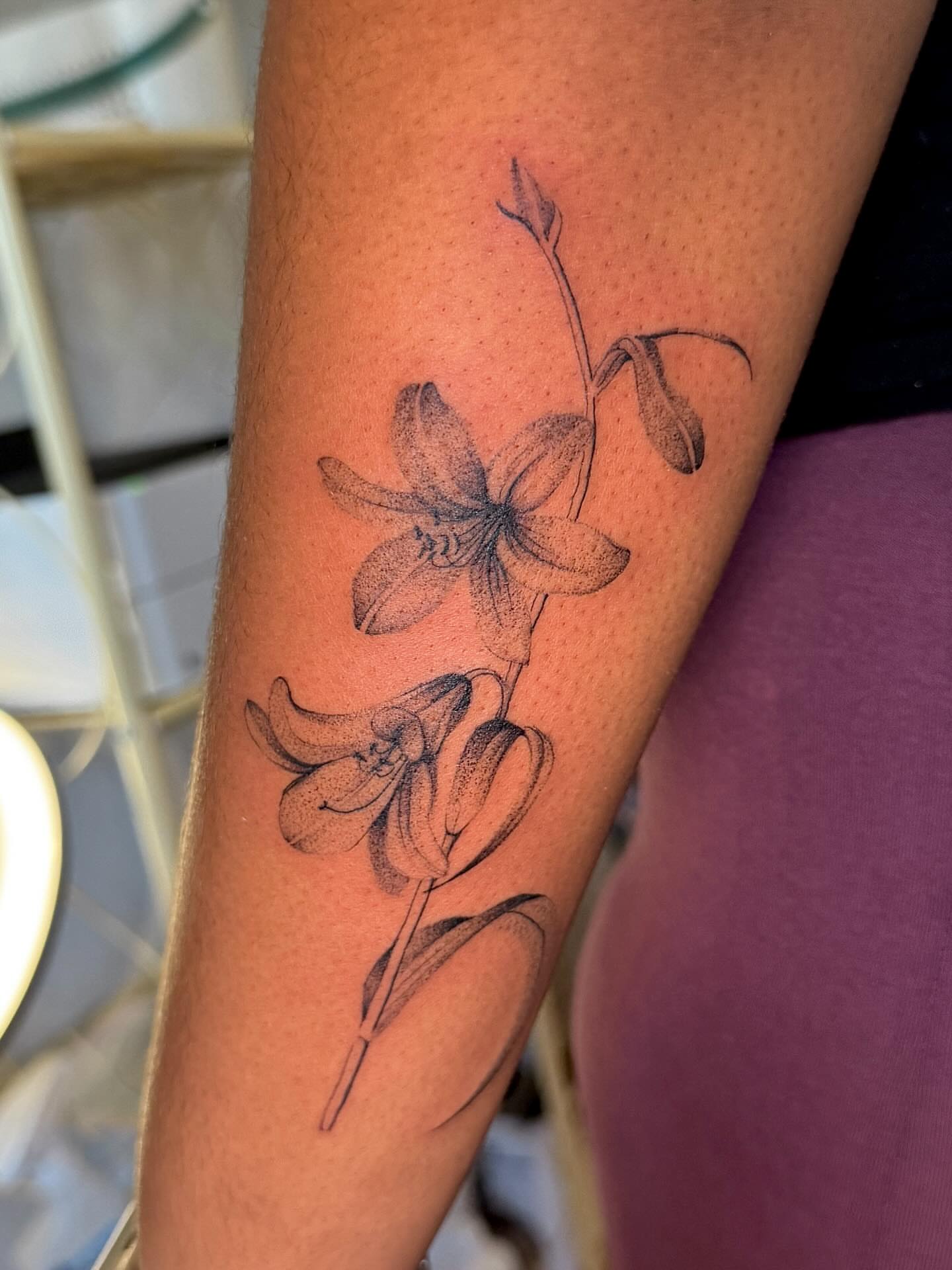 Lily flowers dotwork tattoo on the forearm by tattoos by miss jackie o 🎱