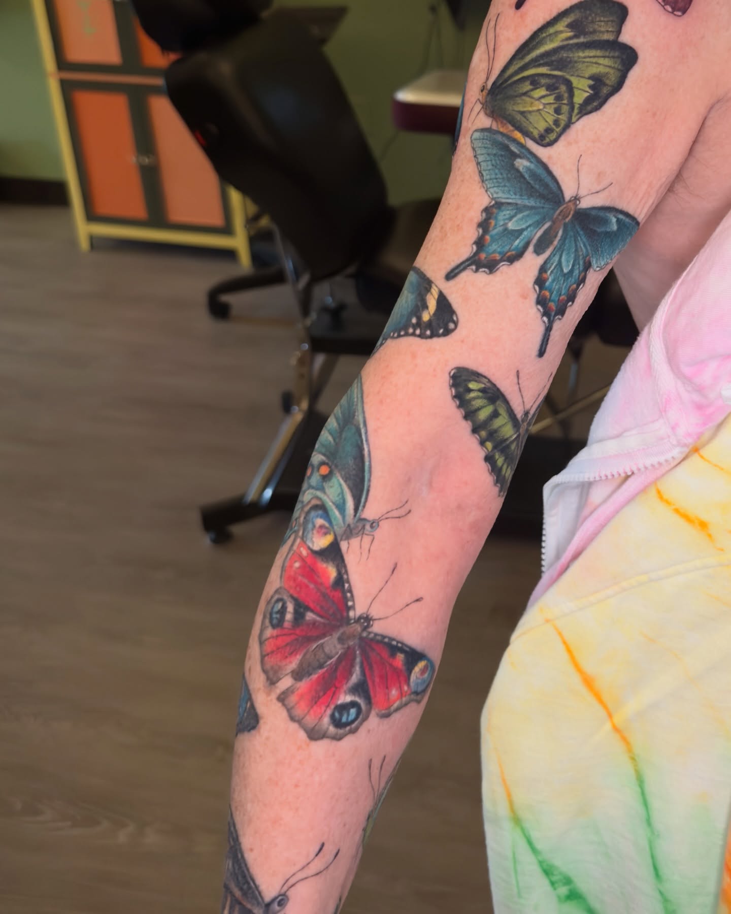 Butterflies realism tattoo on the forearm by Nichole Lorence