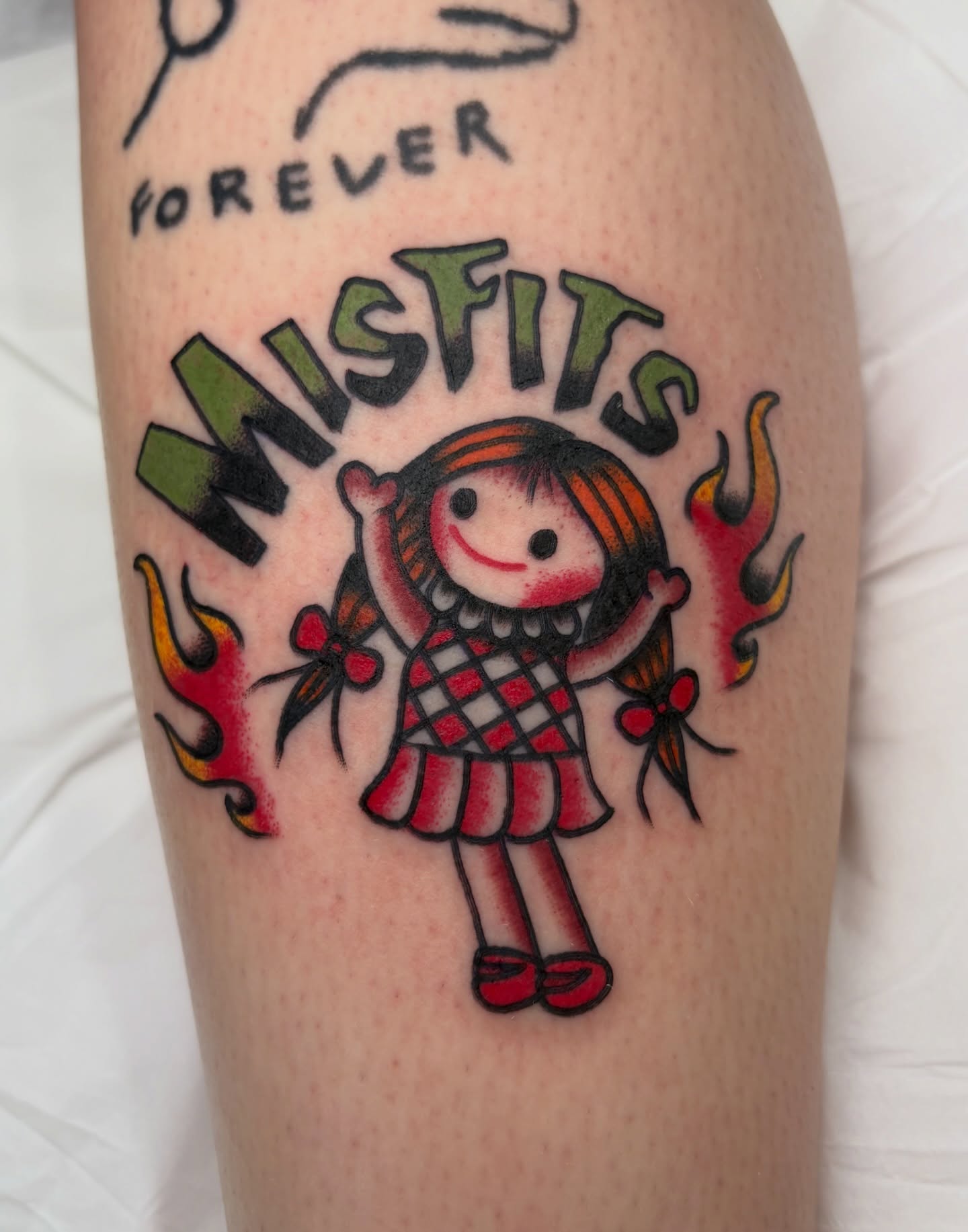 Misfits doll American traditional tattoo on the forearm by Aysia Mankin-Wong, San Francisco, California
