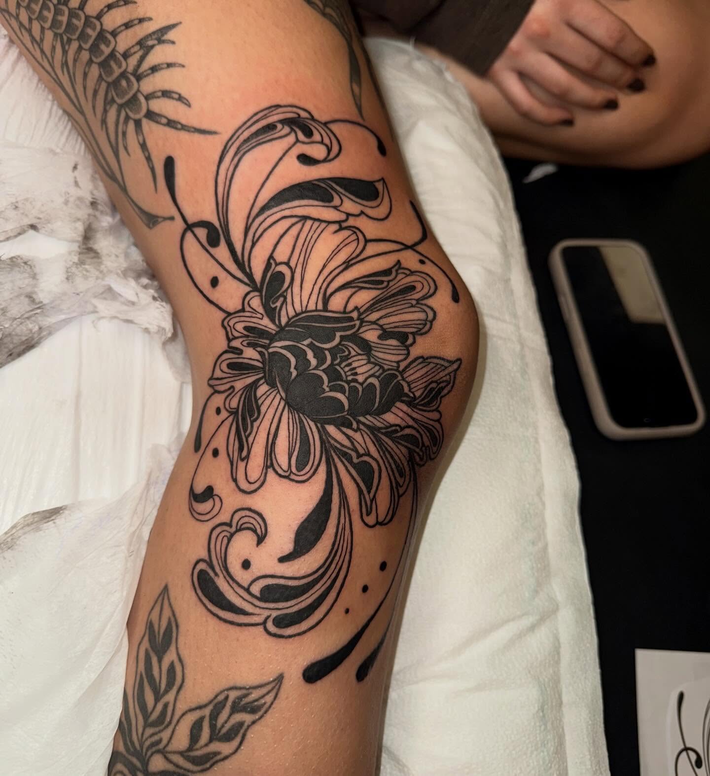 Flower black and grey tattoo on the forearm by Laurito
