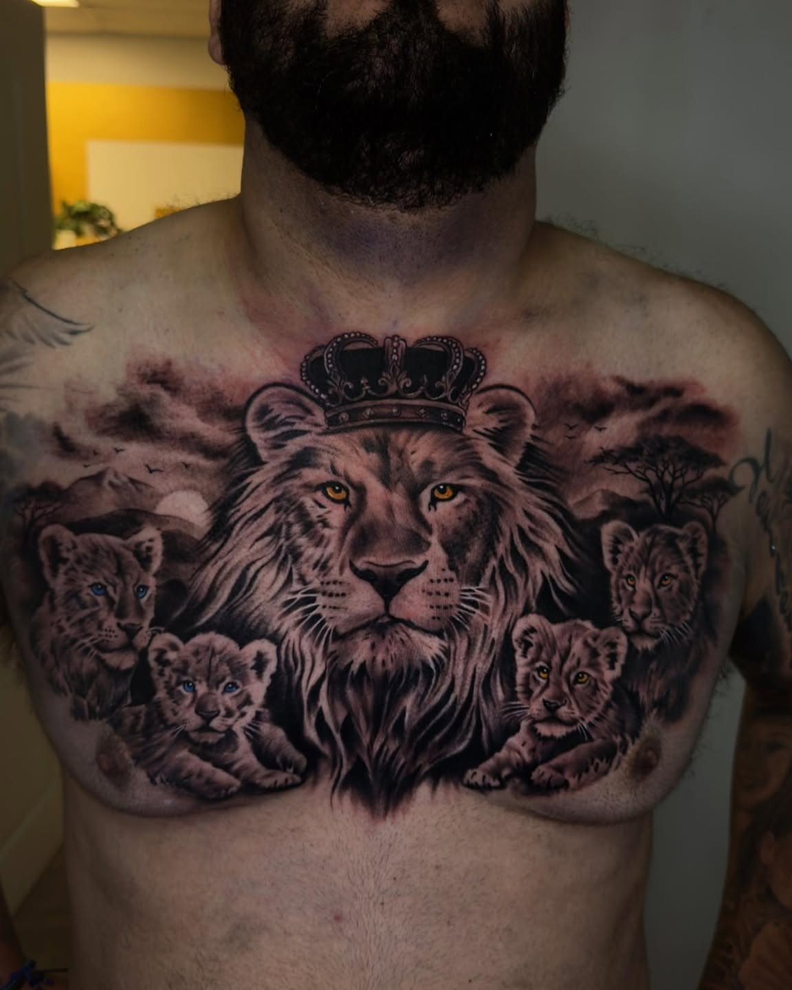 Lion family realism tattoo on the chest by Ayala Jose