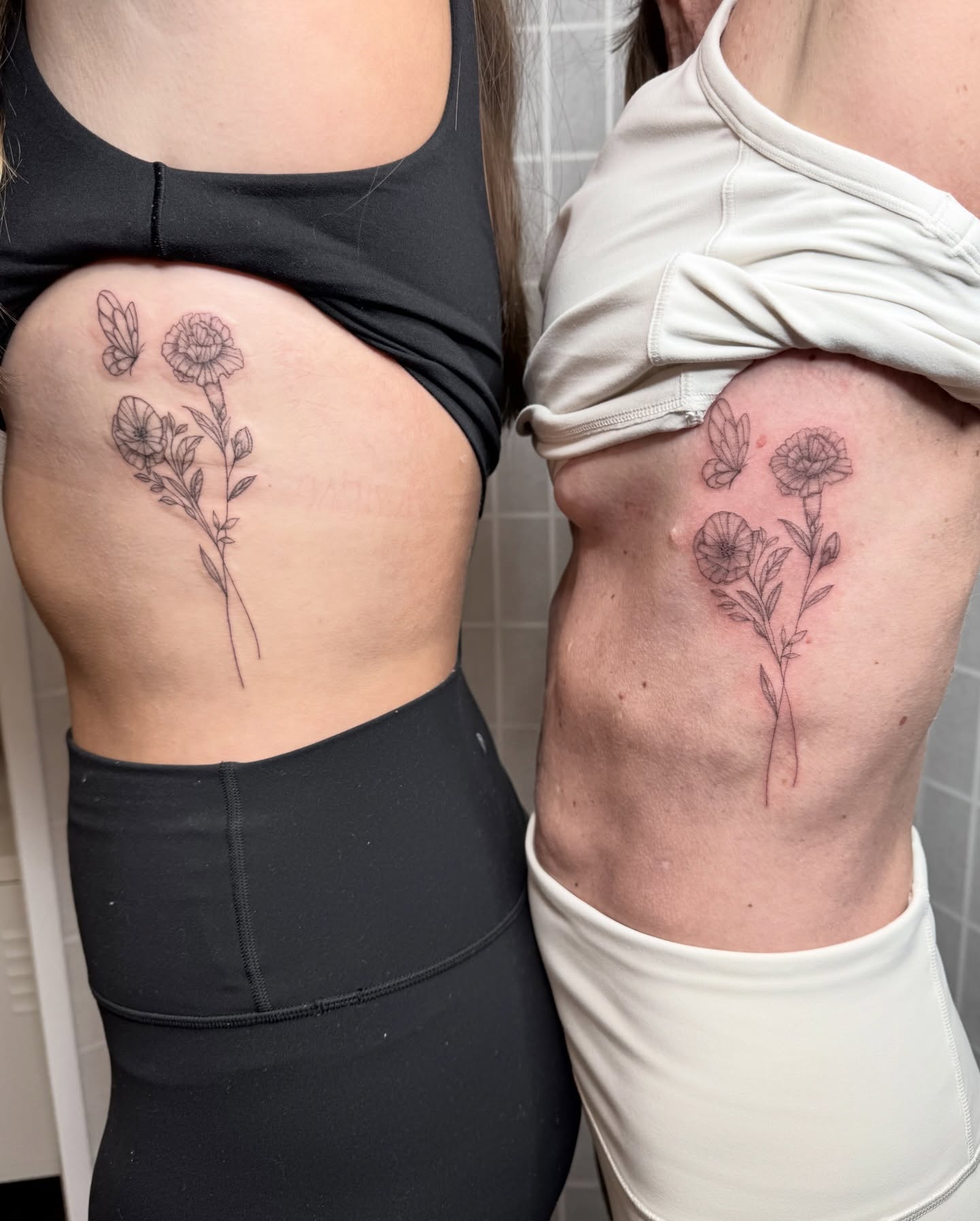 Flower and butterfly black and grey tattoo on the ribs by Dama