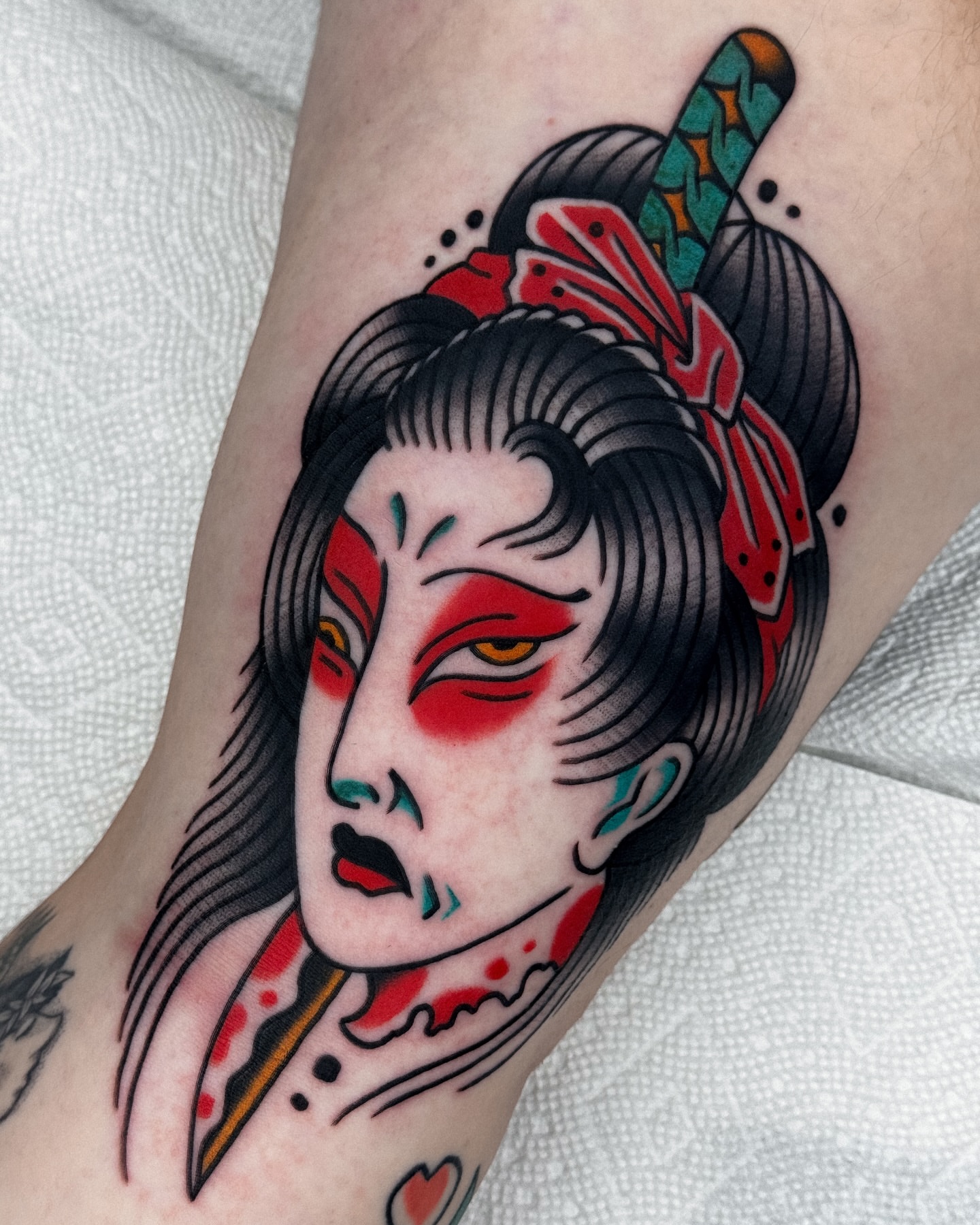 Geisha American traditional tattoo on the forearm by Samuel Dickey