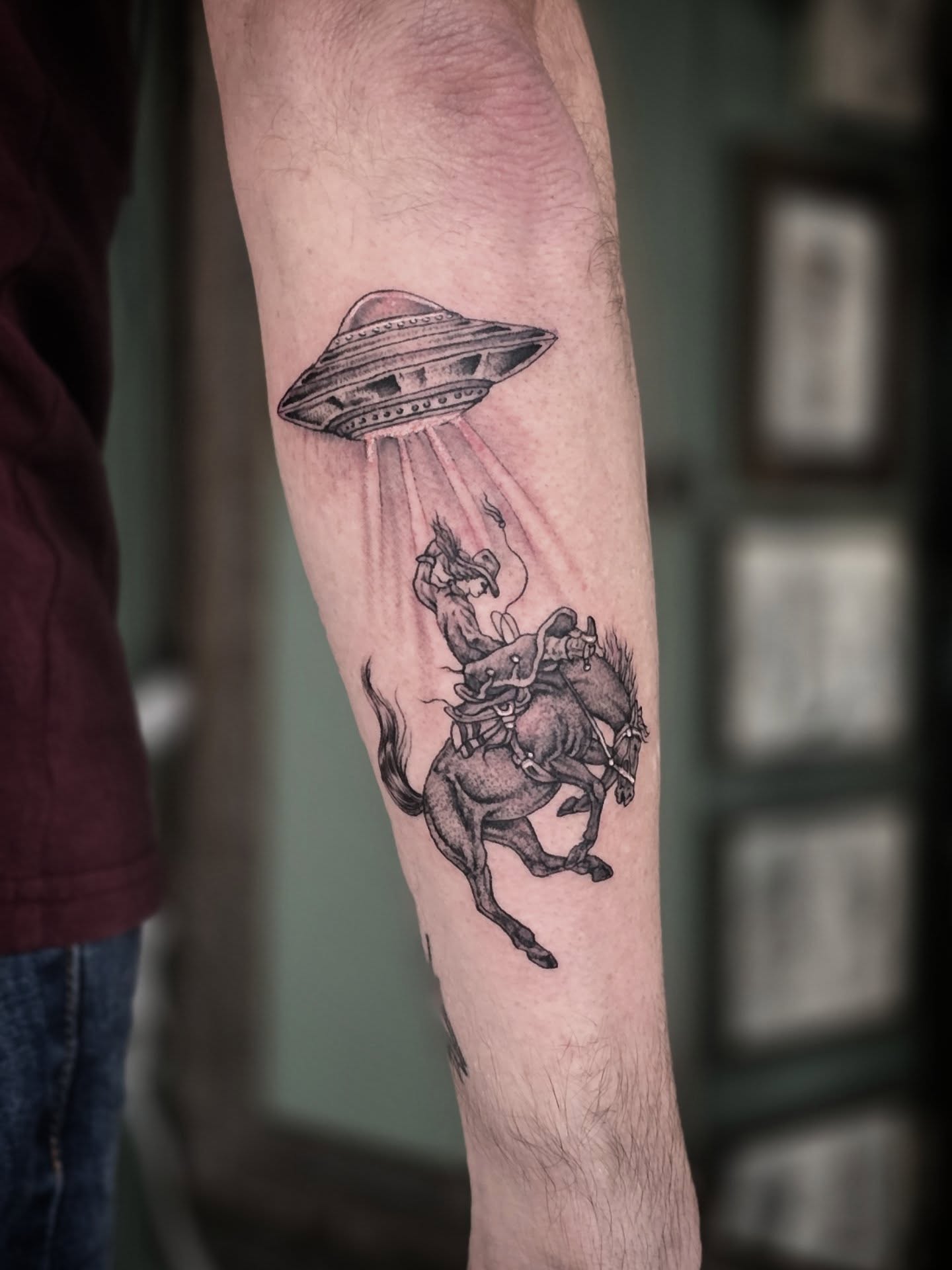 UFO abduction realism tattoo on the forearm by Aaron Dor