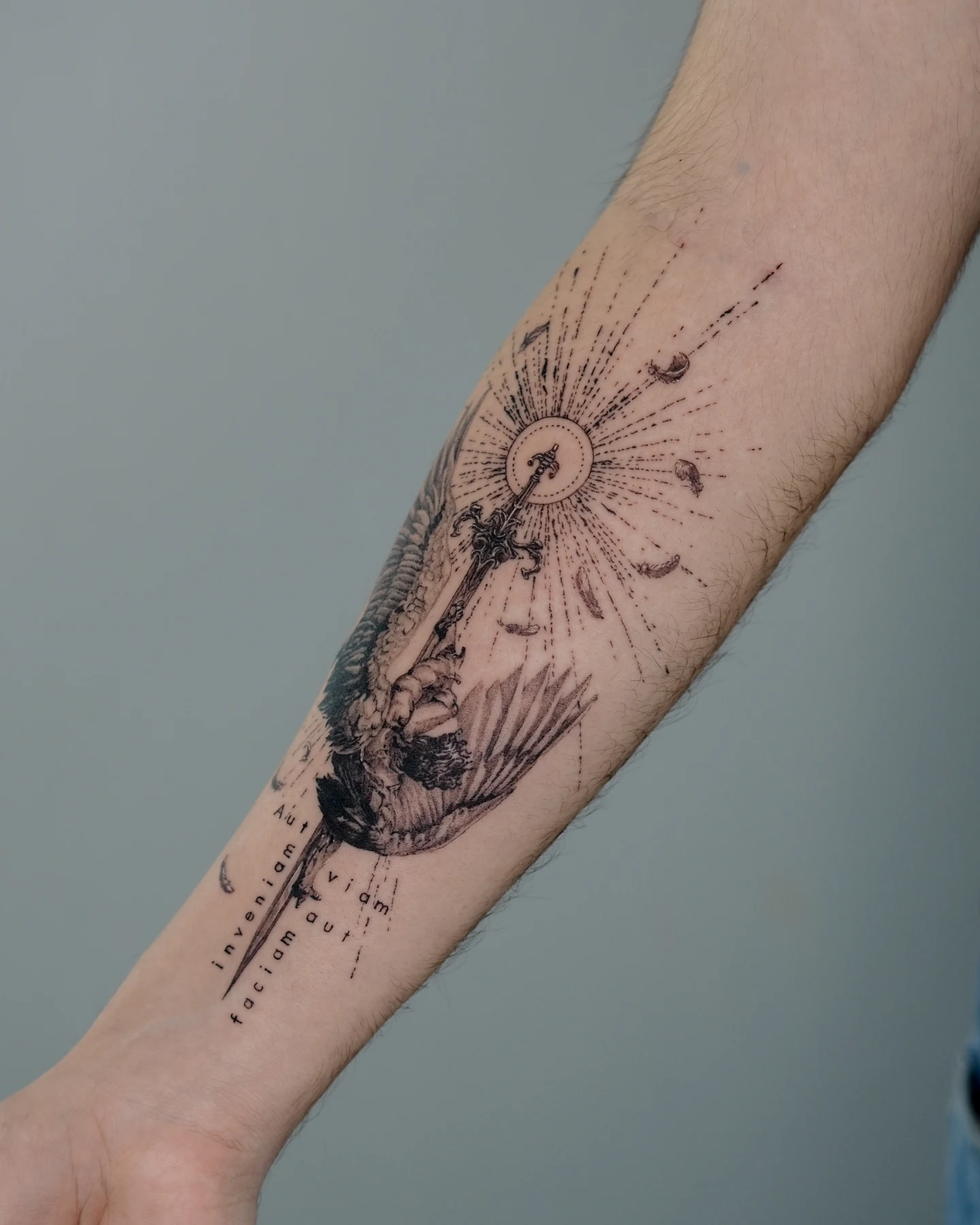 Astronaut with sunburst dotwork tattoo on the forearm by MK