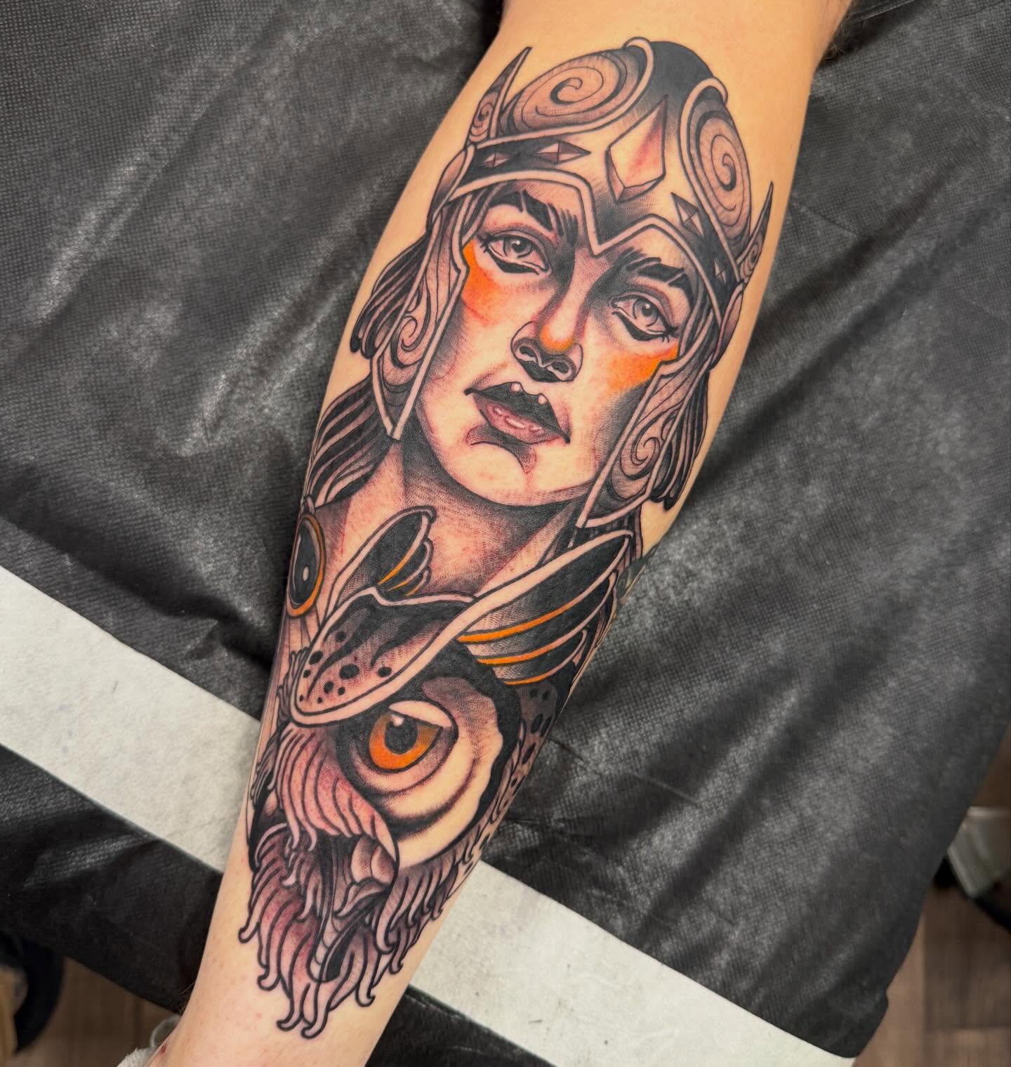 Woman with owl American traditional tattoo on the forearm by Spencer Webb